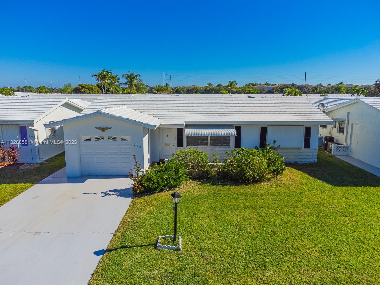 Cozy 2/2 in Leisureville is ready for your personal touch! Property features ceramic tile and carpet floors, front porch, one-car garage and so much more. Association claims 55+. Make this your home today!