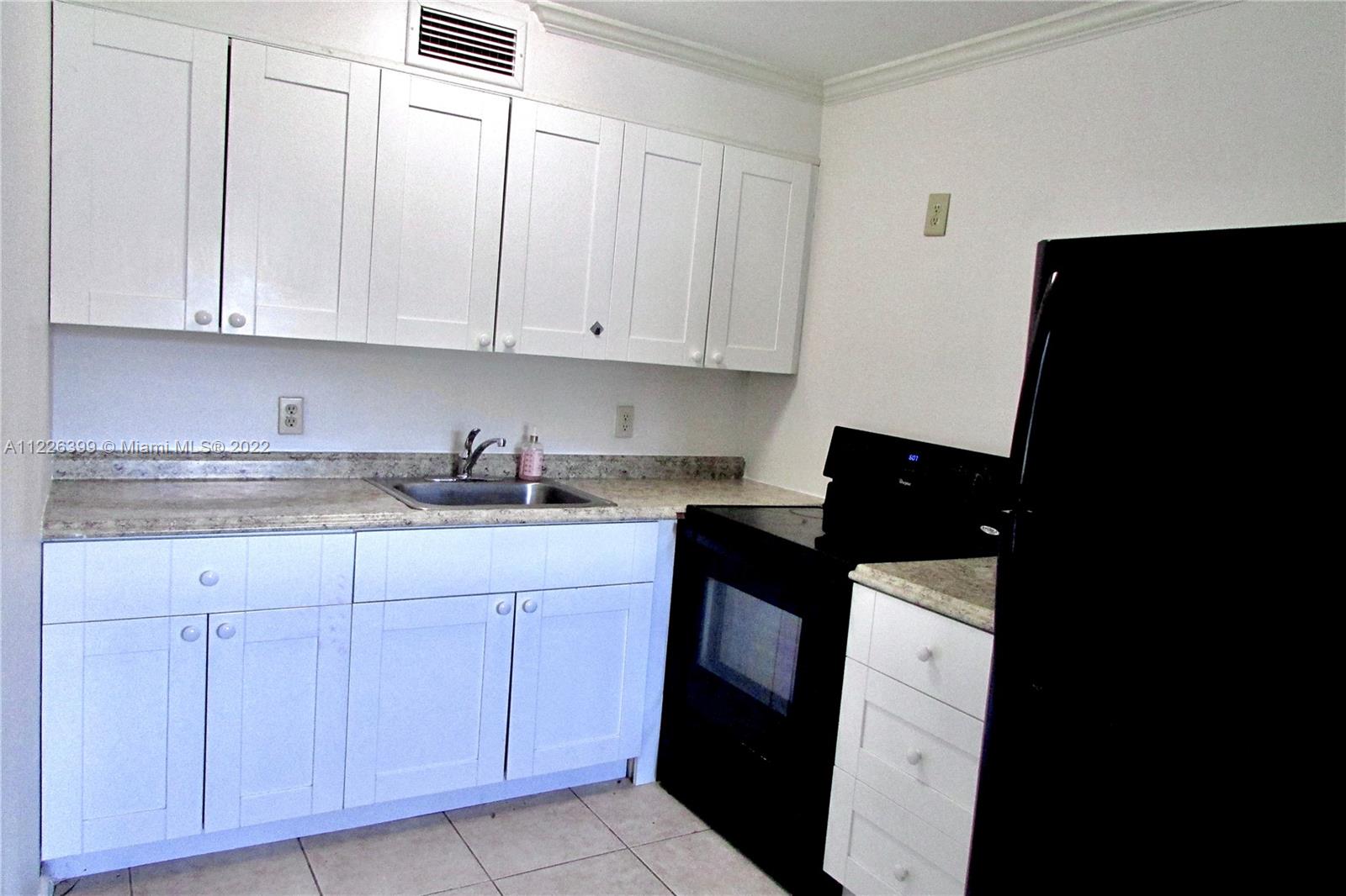 PRICE REDUCED!! PRICE TO SELL!! Freshly updated 1st floor unit featuring tiles throughout. Updated kitchen featuring NEW Cabinets and Appliances. Bathrooms beautifully renovated with New Tiles and Vanity. Covered Porch overlooking Beautiful Green Garden. This Bright and Spacious Condo is ready for move In. Enjoy this Amazing Century Village 55+ Community with an Active Adult Lifestyle. The Clubhouse has 24 Hour Security, Gated Community, Great Fitness Center, Movie Theater, Shows, Library, Dancing, 16 Heated Pools, Tennis, Pickle-Ball, Shuffle Board, Billiard Tables, Transportation To Malls, Restaurants, Doctors And Much More. 1st Year NO Rental /3 Year old Water Heater / Central Air!