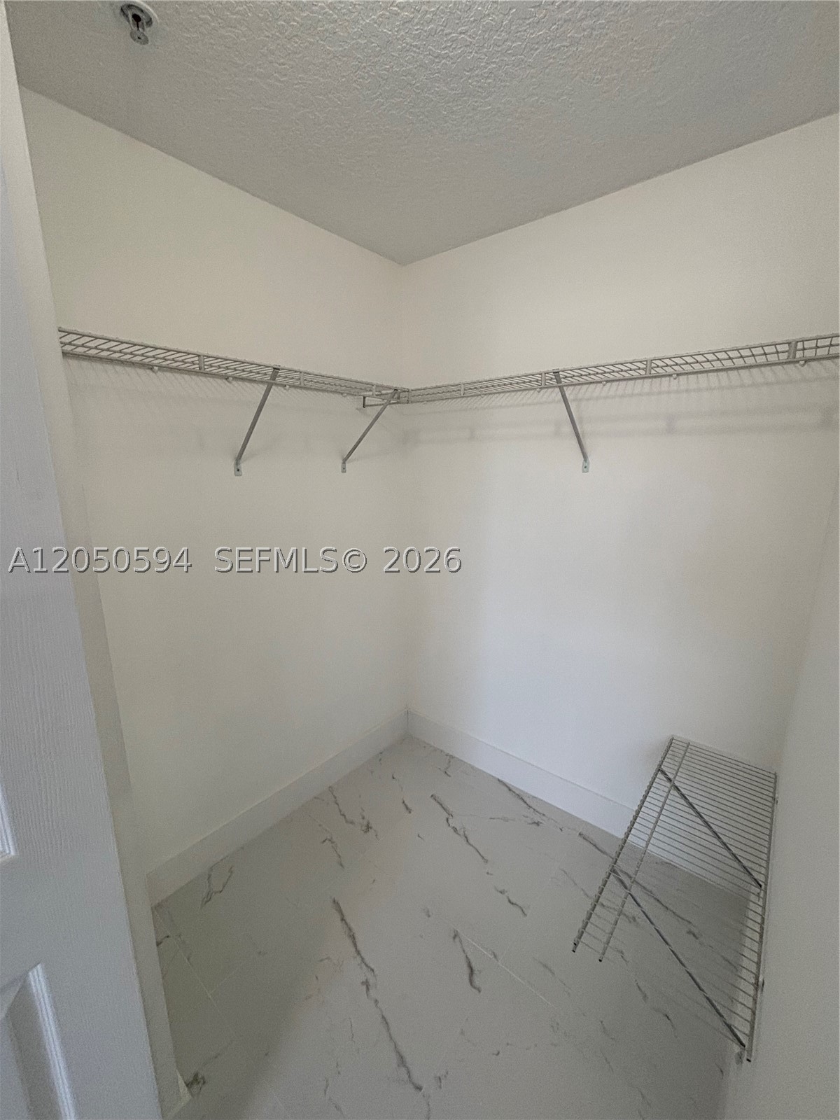 THE COURTS AT DORAL ISLES - Residential Lease