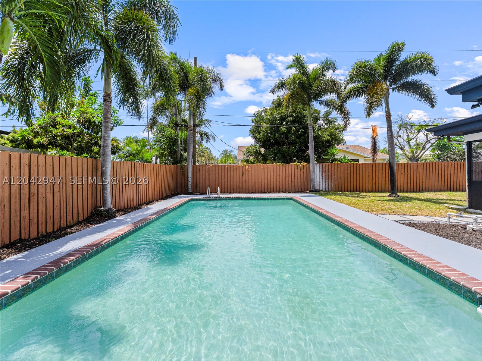 Welcome to this stunning, like-new Coastal Modern Pool residence in Village of North Palm Beach, just minutes
from the water. This new construction 4BD/2BA home has been redesigned from the ground up with high-end
finishes throughout. The open-concept layout showcases 40x40 two-tone porcelain tile floors and a designer
European kitchen with an oversized 9 foot island in Calacatta Quartz, two-tone cabinetry, stainless steel
appliances, pantry, built in microwave and bar/coffee station with a wine cooler for added convenience. The pool
house extends your entertaining space beautifully. The master suite is a true oasis with French doors opening
directly to the pool and a luxurious his-and-hers bathroom with upgraded porcelain large tile. The secondary bath
also features quality finishes throughout. Enjoy the screened-in patio — perfect for relaxing or entertaining in
style. Additional highlights include a 1-car garage with FULLY permitted garage door, all-impact windows and
doors, brand-new plumbing, electrical, and mechanical systems. Circular driveway is another convenient feature.
This home delivers coastal elegance, modern luxury, and total peace of mind. Close to Anchorage Park & Marinara
with dog parks and boat ramps. The home is also just minutes from the North Palm Beach Country Club, offering
golf, tennis, restaurants and oversized heated pool and splash pad. MUST SEE!