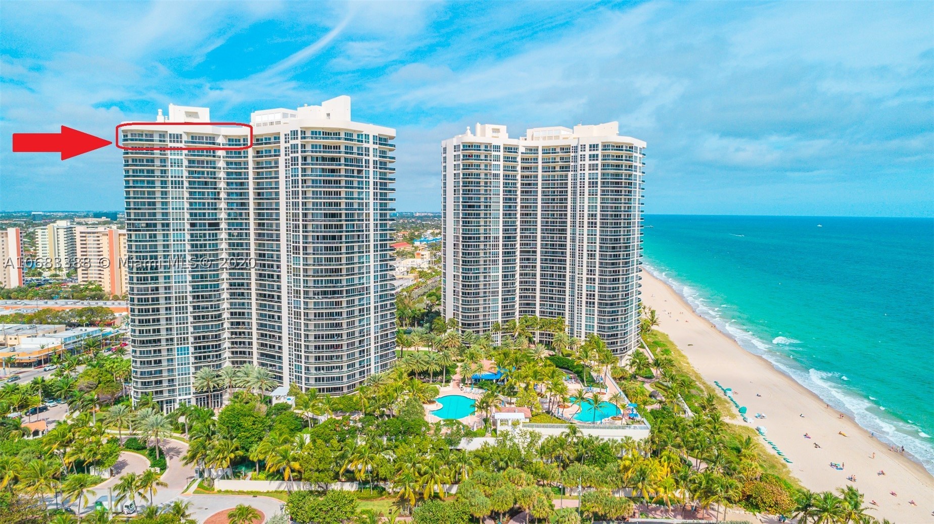 DEAL OF THE DAY-Live above the rest in the just refreshed Grand Penthouse at L’Hermitage. Enjoy spectacular views of sun, sea & city from 6 private balconies in this 6,600+SF residence. PRICED BELOW APPRAISED & MARKET VALUE! Original owners created unique masterpiece merging 3 units to 1. This trophy residence has a split floor plan w/separate elevator/entrance to guest wing, 4 bedrooms w/ensuite bathrooms, 2 custom offices, 2 powder rooms, eat-in kitchen, guest kitchenette, formal dining room, living room & bar. Large master suite w/wet bar, roman tub, shower, dual vanities & 2 big walk-in closets. 3 prime parking spots & 3 storage units. Can come designer decorated (addl. fee). Resort-style community w/10 acres of beachfront, 2 tennis courts, pools, saunas, café, concierge, valet, gym +.