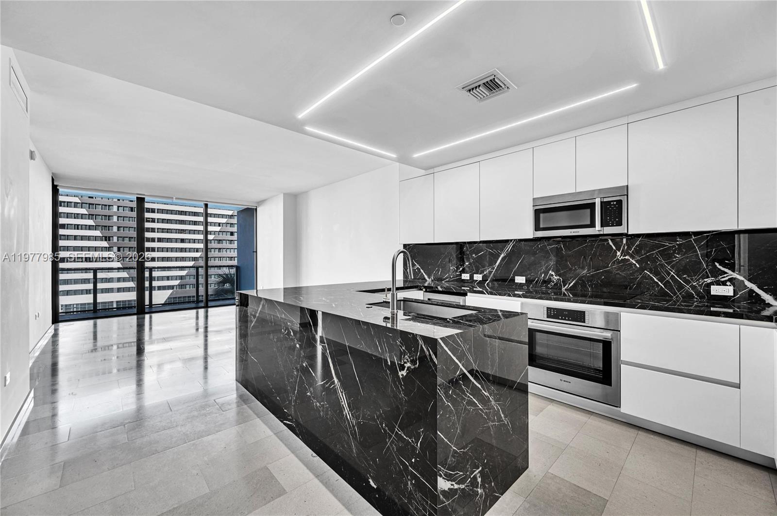Experience sophisticated city living at Rise Brickell City Centre. This stunning residence features designer lighting, custom Italian closets and doors, and a remodeled, expanded kitchen with elegant premium countertops. Every detail showcases European flow and timeless design with high-end finishes throughout. Perfectly located in the heart of Brickell, you’re just one elevator ride away from Casa Tua Cucina. This unit offers the ideal space for your family or a smart investment property in one of Miami’s most desirable addresses. Enjoy exceptional amenities including a resort-style pool, relaxation areas, BBQ zone, and a state-of-the-art gym. Actual square footage is approximately 2,100 sqft (vs. 1,898 recorded) due to a city appraiser error.