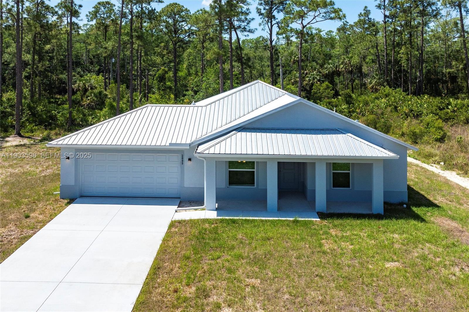 Welcome to this beautifully newly built 3-bedroom, 2-bath home in Lehigh Acres. Step inside to an open-concept living area filled with natural light, where 10-foot vaulted ceilings and elegant porcelain tile flooring set the tone for modern comfort. The kitchen is a chef’s dream, featuring granite counters, a large center island, stainless steel appliances and plenty of storage. Outside, a generous covered patio invites you to relax or entertain, while the quiet cul-de-sac location offers added privacy and peace. Moments from shopping, dining and schools, this home effortlessly blends style and convenience — a perfect place to make your next chapter. Inquiry about potential seller financing.
