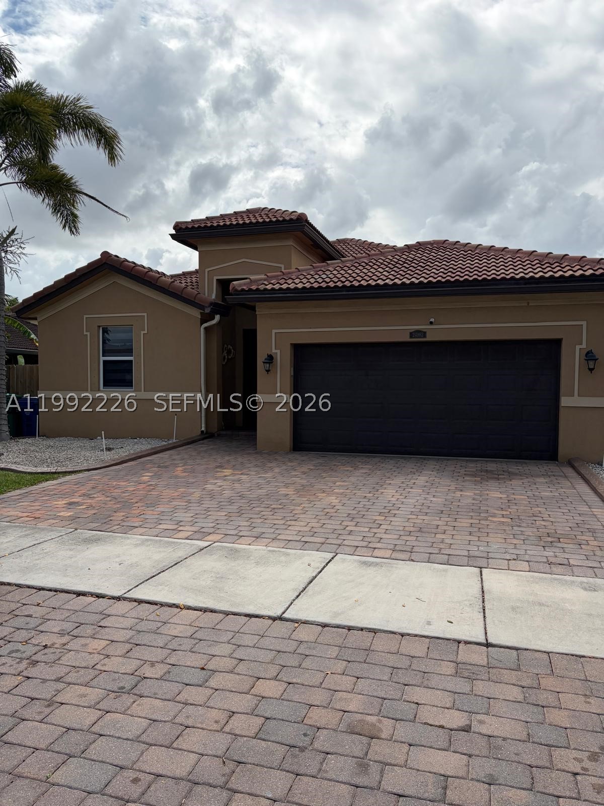 Beautiful and spacious 3-bedroom, 2-bath single-family home located in the highly sought-after Hemingway Point community. This well-designed home features a functional split floor plan, with two bedrooms and a full bath situated on one side of the home, while the private primary suite is tucked away for added comfort and privacy. The primary bedroom offers dual closets and an en-suite bathroom complete with both a tub and separate shower. Enjoy the convenience of a 2-car garage, impact-resistant front and rear doors, and hurricane shutters throughout the remainder of the home. Situated in a well-maintained community with very low HOA fees, this property offers both value and peace of mind.