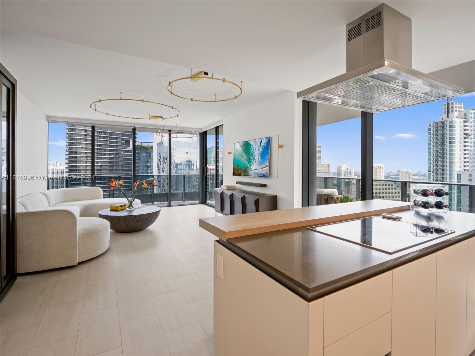 Stunning Condo in the Iconic Flatiron Building!
Welcome to your dream home in the heart of Miami’s! This exquisite condo offers breathtaking views that will leave you in awe. 
Unit features contemporary finishes, an open-concept layout and high-end materials throughout. Enjoy luxury living with a spacious living area, perfect for entertaining.
Retreat to the spacious primary bedroom and your bathroom with a view. Even a bathtub has a view here. The additional bedroom is perfect for guests. There is also a third room that can serve as a home office.

Residents enjoy access to a range of premium amenities, including a rooftop pool, fitness center, spa, and a beautifully landscaped terrace, entertainment room, private cinema

Schedule your private showing today.