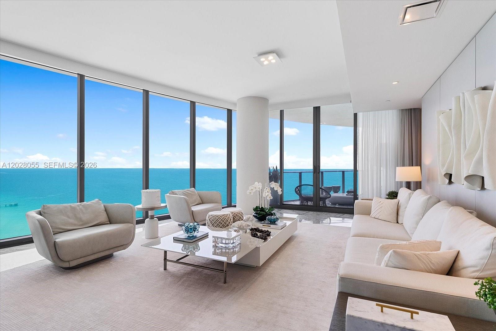 Oceanfront Sanctuary at The Ritz-Carlton Residences, Sunny Isles Beach. Experience extraordinary oceanfront living in this spectacular 3-bedroom, 3-bathroom, 1 powder room residence encompassing 3,008 square feet at the prestigious Ritz-Carlton Residences. Designed for those who appreciate uncompromising luxury, this exceptional home offers an unparalleled blend of elegance, comfort, and world-class service. Floor-to-ceiling glass showcases breathtaking views of the Atlantic Ocean, Intracoastal Waterway, and Miami skyline, with expansive living spaces with natural light. The thoughtfully designed floor plan seamlessly combines sophisticated interiors with generous outdoor living areas, creating the perfect setting for both entertaining and everyday enjoyment. The gourmet kitchen is appointed with premium appliances, custom cabinetry, and refined finishes, catering to the most discerning culinary enthusiasts. The spacious primary suite serves as a private retreat, featuring a luxurious bathroom, while the additional bedrooms provide comfort and privacy for family and guests. Residents enjoy access to The Ritz-Carlton's legendary five-star services and amenities, including a private oceanfront beach, resort-style swimming pools, state-of-the-art fitness center, spa facilities, concierge services, valet parking, private dining experiences.