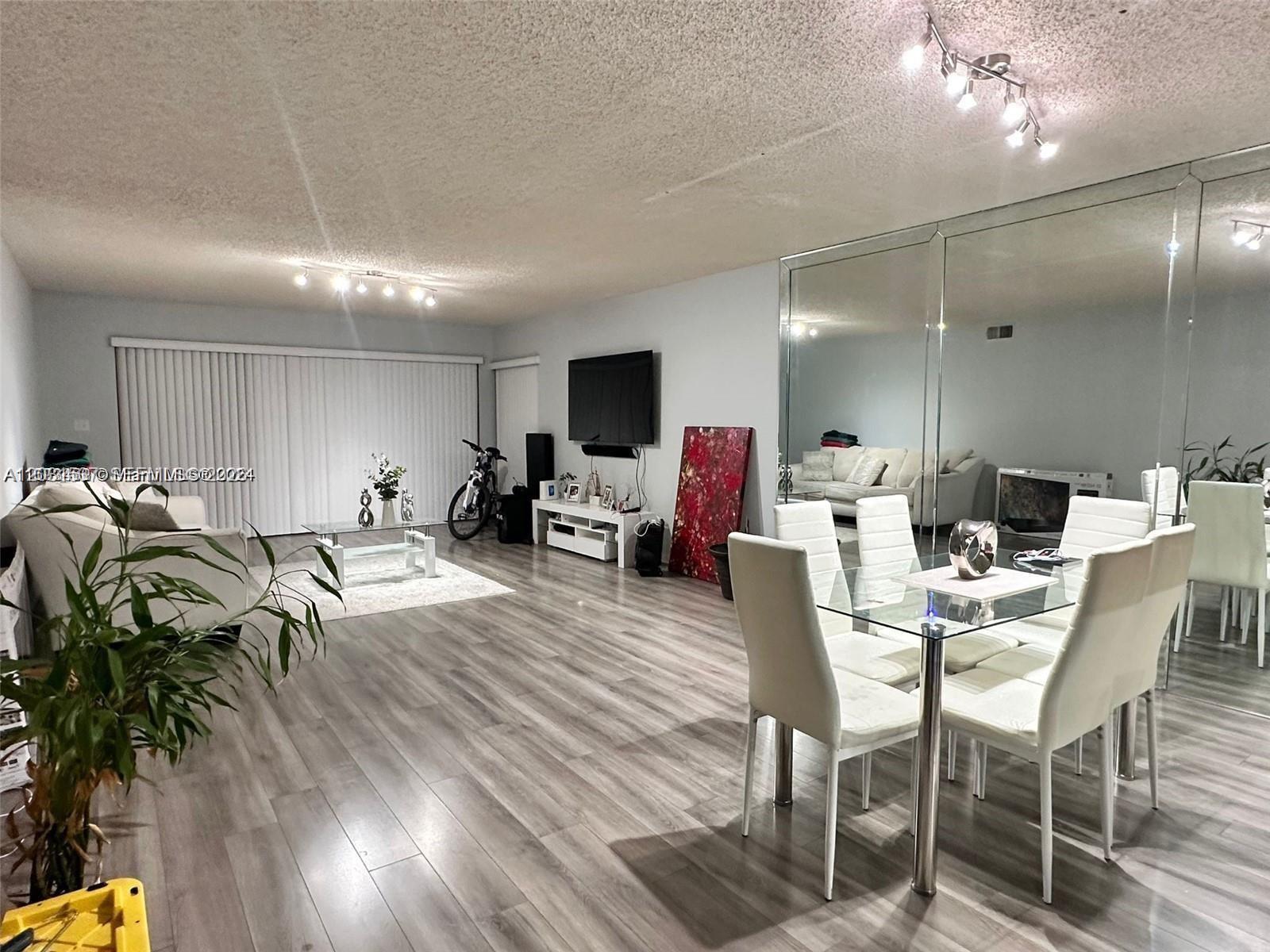 Beautiful, bright, and exceptionally spacious 2-bed/2-bath residence offering over 1,400 sq ft of living space. This oversized unit features abundant natural light, huge closets, and a private in-unit laundry/storage room with washer and dryer. Both bathrooms have been tastefully renovated.

The community has been fully updated and offers resort-style amenities including two swimming pools (one lakeside), BBQ area, sauna, fitness center, jacuzzi, billiard room, ping-pong table, and clubhouse. Enjoy the security of a 24-hour manned gate and a prime location just minutes from the beach and Aventura Mall.

Owner will pay the special assessment in full. All ages welcome. Pets allowed only with ESA documentation. Motivated seller — send your offer!