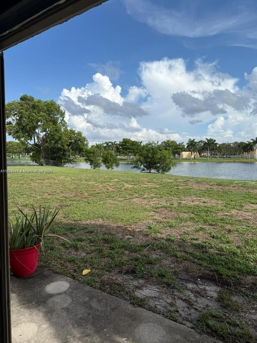 Beautiful lake view 2 bedroom and 1 bathroom apartment in the gated community of Lakeshore. Updated kitchen with stainless steel appliances, washer and dryer inside the apartment, updated bathroom.