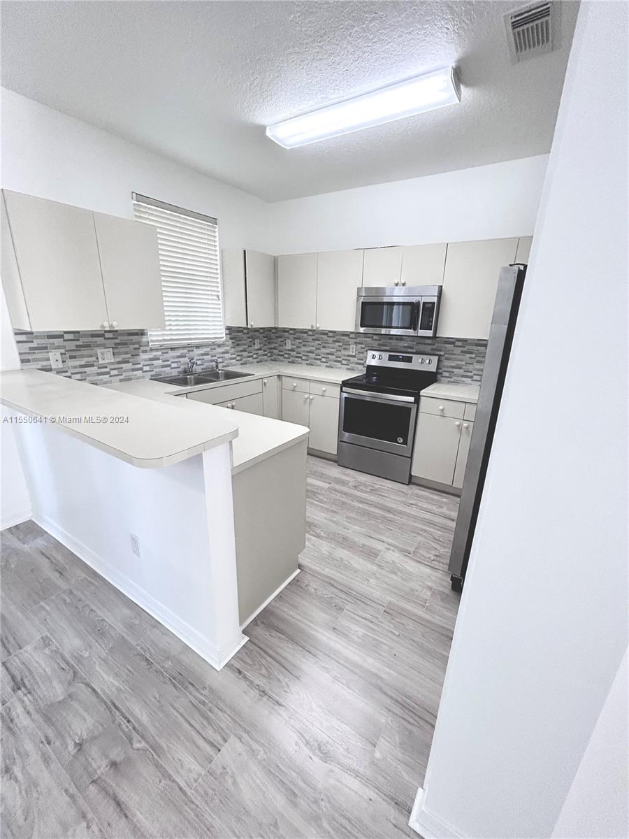 SANDCASTLES AT DORAL - Residential Lease