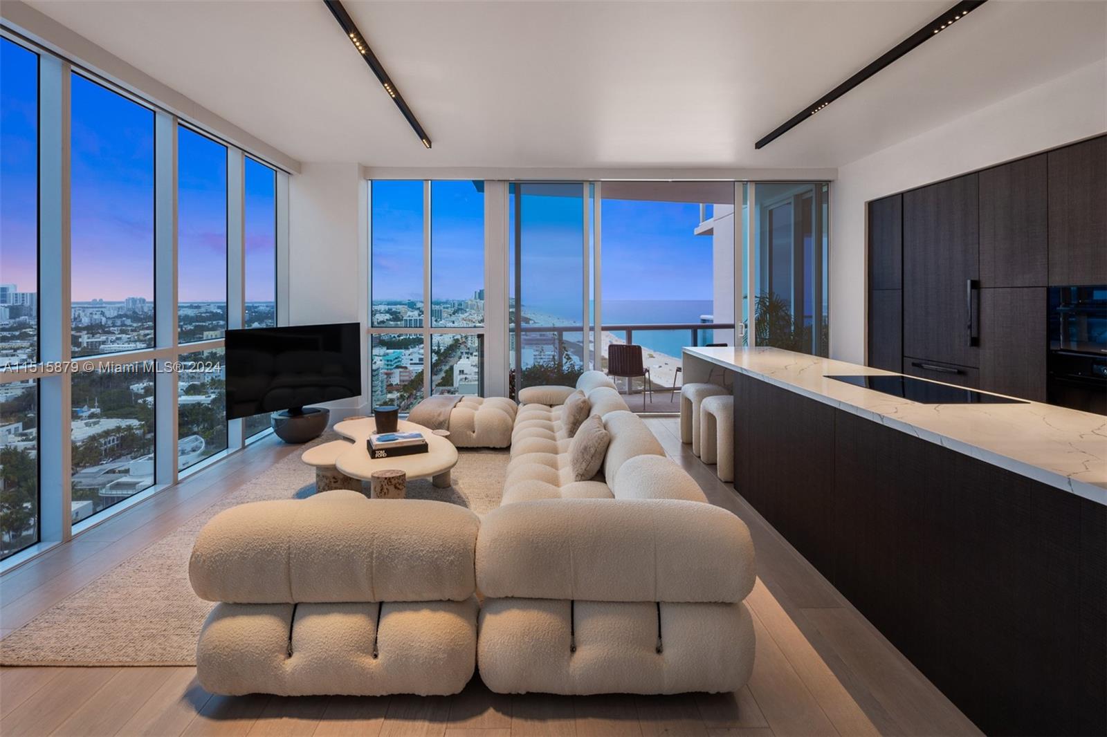 Exquisitely remodeled and situated at the highly coveted Continuum in the South of Fifth neighborhood, this remarkable residence reflects a commitment to uncompromising quality. Enter through the private foyer to be greeted by breathtaking views of the Atlantic Ocean, Biscayne Bay, the Downtown Miami Skyline, and the entirety of South Beach. A harmonious fusion of opulence and innovation, elements of this home feature Oak flooring, custom kitchen and closets, state-of-the-art appliances and an impeccably crafted primary suite. The Continuum, a resort-style haven spread across 12 acres with 1,000 linear feet of ocean frontage, offers beach service, an on-site restaurant, two lagoon-style pools, one lap pool, 3 clay tennis courts, and an expansive 20,000 SF fitness center & spa.