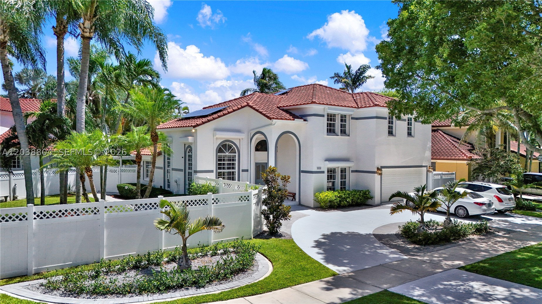 Renovated 5BD/3BA 2-story home in Palmetto Bay with a pool, canal views and no rear neighbors. Engineered hardwood throughout, plantation shutters, new LED fixtures, and new wrought iron staircase with brushed gold finish. 3 fully remodeled bathrooms with new tile, frameless barn door shower enclosures, shaker cabinets, brushed gold fixtures, and Toto toilets — electronic bidet in primary. One bedroom & bathroom on first floor. Closets By Design in all bedrooms. Kitchen features solid wood cabinetry, 36" electric range top, beverage cooler, and pass-through window to screened porch. Saltwater pool resurfaced with new tile, coping, deck jet, and all-new equipment. Screened porch with 24" Carrara marble tile. Solar panels, underground propane tank, generator-ready. Brick paver driveway, 6' vinyl privacy fencing, Rainbird irrigation, landscape lighting. A-rated schools. Cinderblock and poured concrete construction on both floors, 10 ft BFE, rolling hurricane shutters on all windows. Less than 1 mile to Palmetto Golf Course, minutes to Jackson South Medical Center and The Falls.