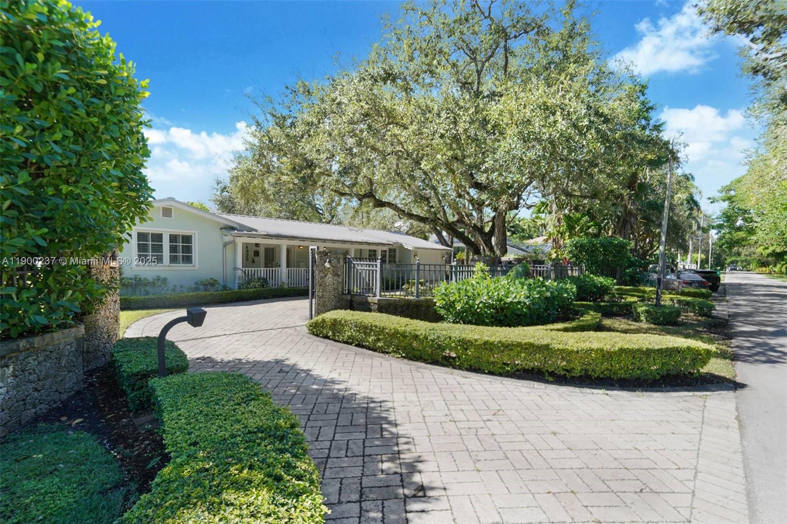 Rare opportunity to own nearly half an acre in the prestigious Ponce-Davis neighborhood—one of Miami’s most desirable and private residential enclaves. There is a charming one-story Key West–style home, three bedrooms, 2.5 baths, a metal roof, and a large swimming pool, surrounded by mature tropical. This corner property also offers endless possibilities—expand the current residence or rebuild a custom estate to match the caliber of the neighborhood. Enjoy tranquility and privacy just minutes from Coral Gables, South Miami, and top-rated schools.