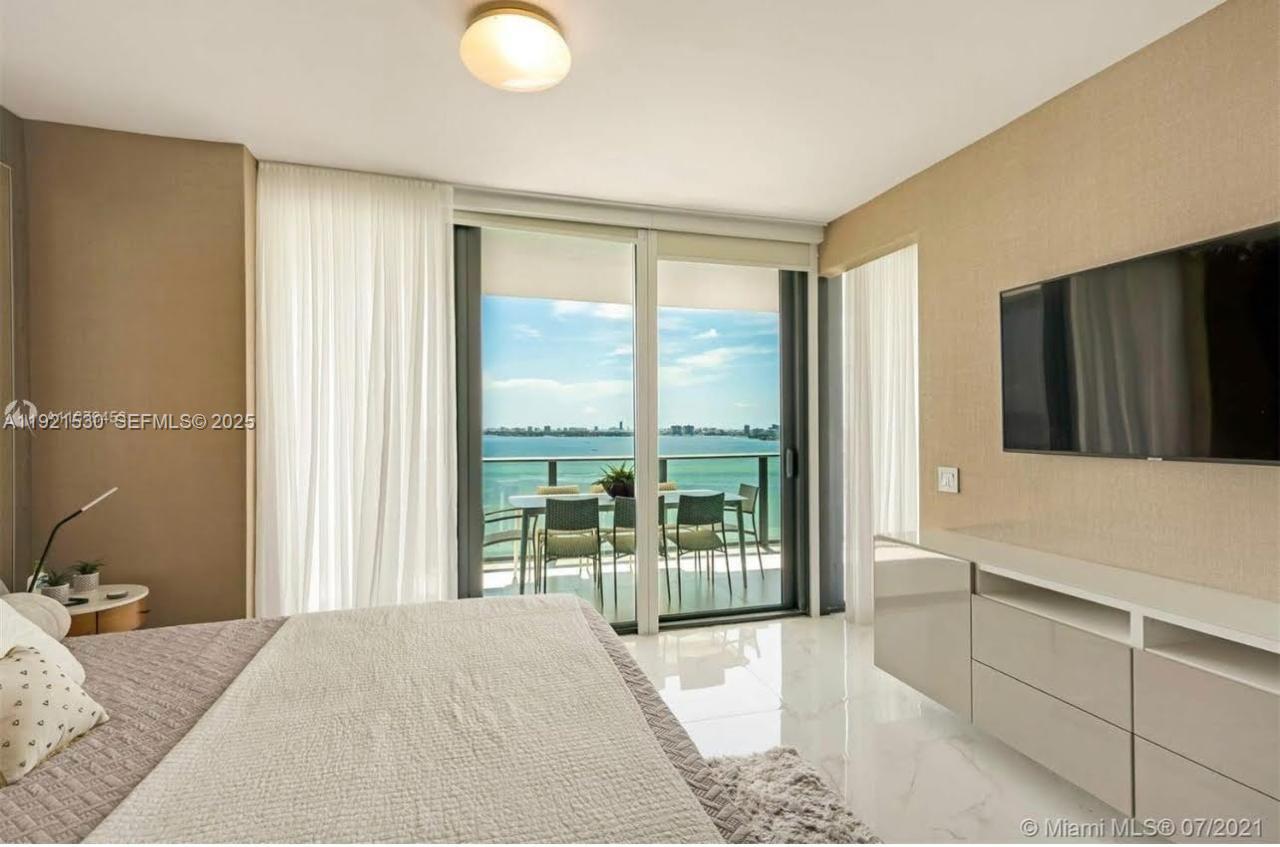 Stylish and move-in ready, this beautifully furnished one-bedroom plus den residence at One Paraiso offers the perfect blend of comfort and sophistication. Enjoy a flexible layout ideal for a single professional or hosting guests, with elegant indoor dining for four and an expansive outdoor dining area accommodating up to eight—all framed by stunning water views. A private elevator provides direct access to the residence, enhancing both privacy and convenience. High-end furnishings by Saccaro and Natuzzi elevate the space with timeless design and quality. Located in One Paraiso, a premier full-service waterfront condominium in Edgewater, residents enjoy world-class luxury amenities and an exceptional Miami lifestyle.