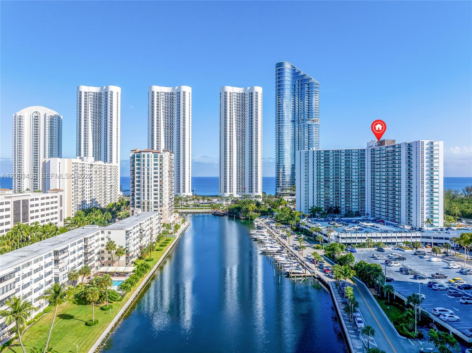 Experience elevated coastal living in this exquisitely remodeled 2-bedroom, 2-bathroom residence at Arlen House East in Sunny Isles Beach. Encompassing 1,521 square feet, this sophisticated home features sleek white porcelain flooring throughout and a meticulously redesigned interior that blends contemporary style with timeless elegance. The open living spaces are filled with natural light, creating an inviting ambiance ideal for both relaxation and entertaining. Enjoy tranquil ocean views from your private retreat, perfectly complementing the serene coastal setting. Ideally situated just across the street from the beach, this residence offers effortless access to the shoreline and the best of seaside living. Located within a secure, well-maintained building, residents benefit from privacy, comfort, and peace of mind. This exceptional offering presents a rare opportunity to own a turnkey home in one of South Florida’s most desirable oceanfront communities, whether as a primary residence or a refined vacation escape.