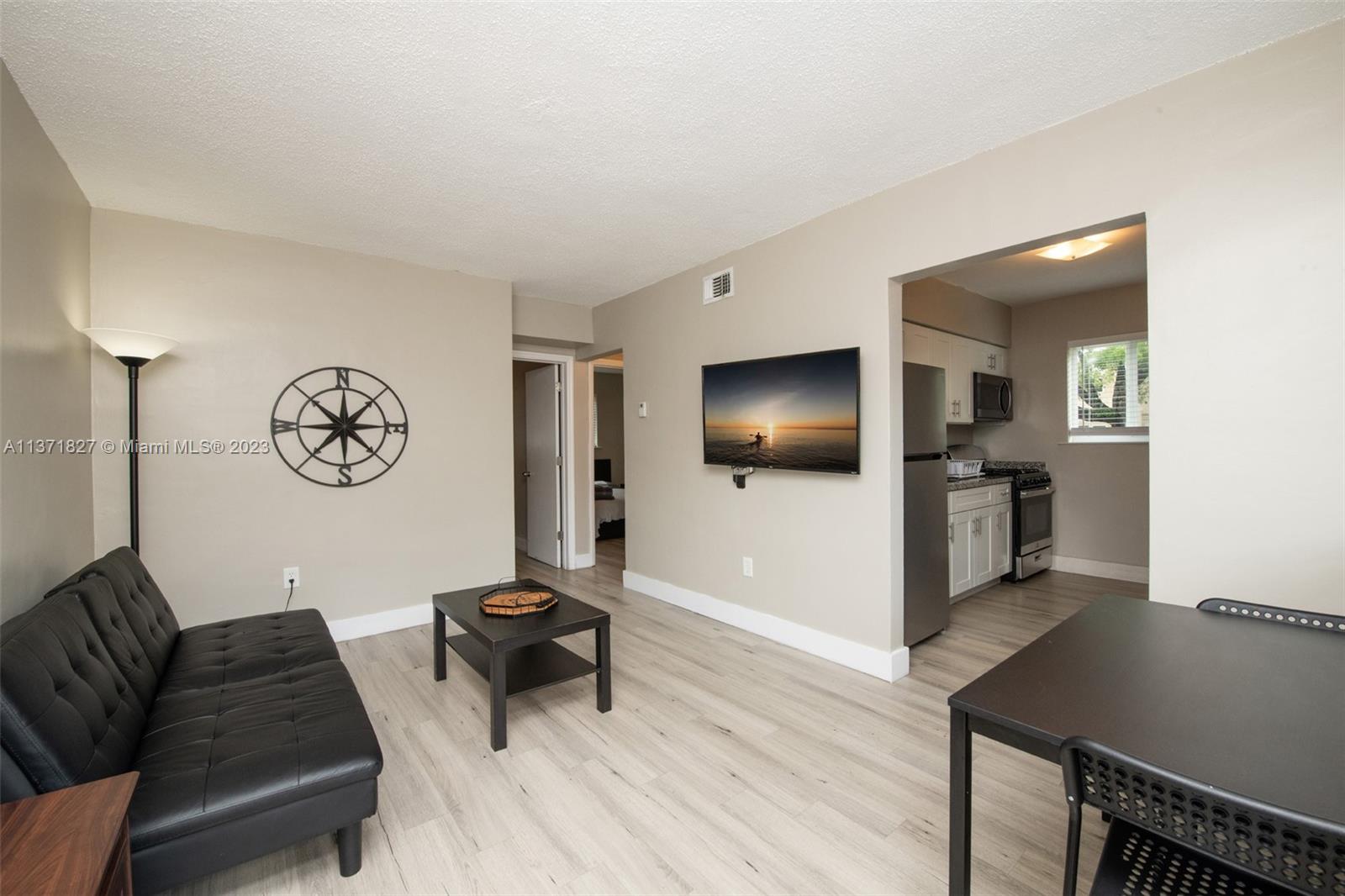 BEAUTIFUL NICE/MODERN AND AMPLE APARTMENT AT WYNWOOD NORTE AT ONE OF THE BEST AND MOST DESIRABLE STREETS, BRIGHT UNIT WITH FRIDGE. MICROWAVE, GAS STOVE, LOWER AND UPPER CABINETS, STAINLESS STEEL REFRIGERATOR, A/C (COLD), CODED LOCK ACCESS, WINDOW TREATMENTS, LIGHT AND FIXTURES, PRIVATE FRONT PATIOS, MODERN LAMINATE FLOORS, PLENTY OF NATURAL LIGHT. CABINET IN BATH. COMMON LAWN YARDS, LAUNDRY ROOM FACILITIES ON BUILDING, ASSIGNED PARKING BACKSIDE OF THE BUILDING. WALKING DISTANCE TO DESIGN DISTRICT AND MIDTOWN STORES ALSO ARTWORK AT WYNWOOD, RESTAURANTS AND BARS. 5 MINUTES TO MAIN HIGHWAY AND 25 MINUTES TO MIAMI INT'L AIRPORT.