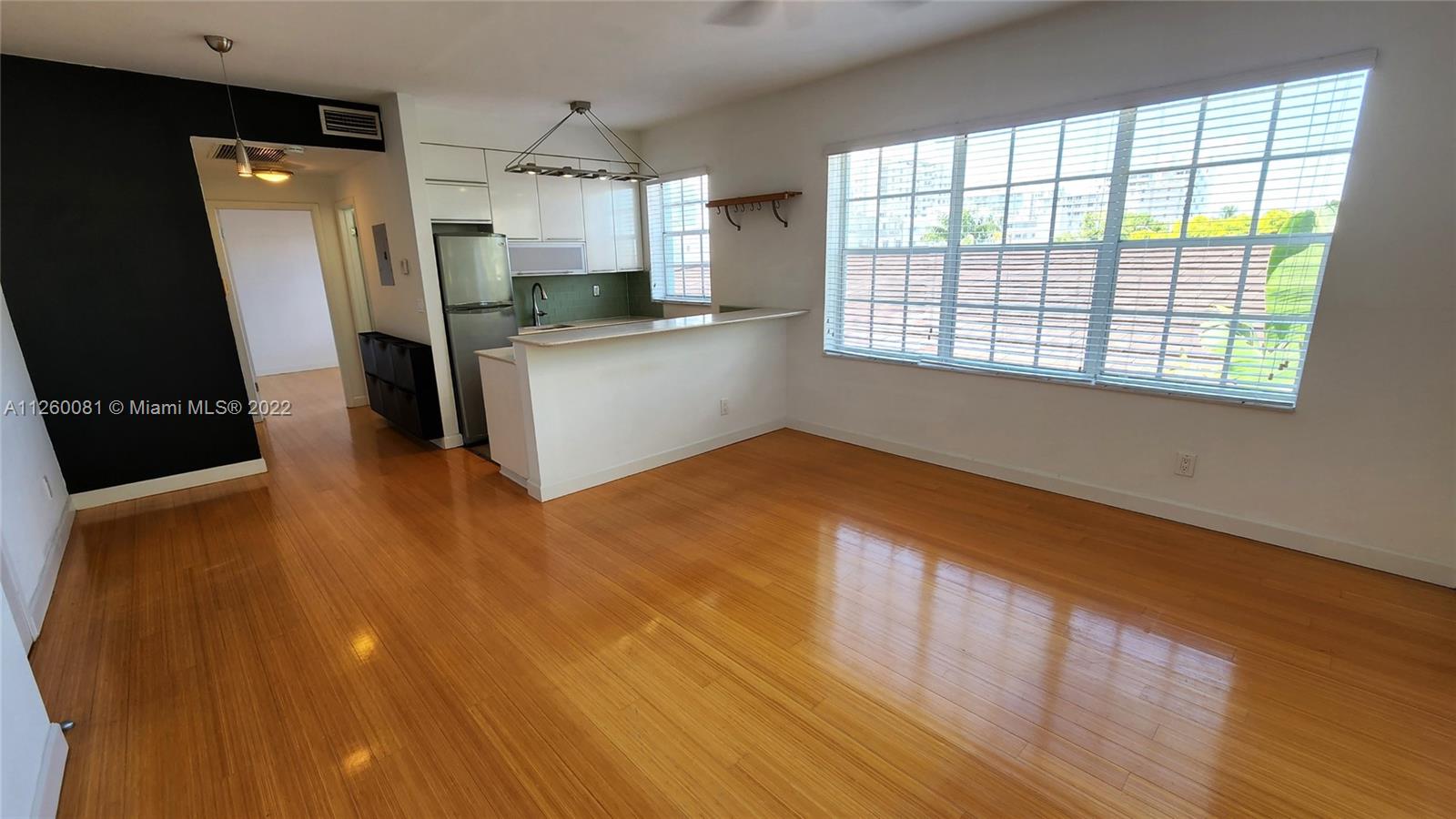 INCREDIBLE LIGHT! Top floor corner unit with HUGE windows for lots of beautiful natural light, yet very private. Updated 1BR condo in meticulously maintained 1924 Mediterranean Revival building! Bamboo floors, white Italian kitchen cabinets, quartz counters and S/S appliances. Gas cooktop and oven. Cool retro-modern bathroom! W/D IN UNIT! Assigned, secured, gated parking space... very rare for a vintage building in South Beach! 1.5 blocks from Lincoln Rd. and 1 block from Alton. GREAT location! Small quiet building with only 12 units - 4 per floor. Smart floor plan, distribution of space, 9' ceilings and enormous windows make this unit feel much larger than 550 sqft. What's not to love? Contact me today to see this exceptional property for lease before it's gone!  It's so good!