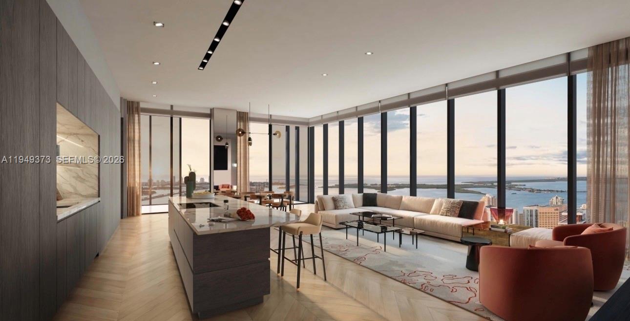 Waldorf Astoria Residences Miami redefines elevated living through the lens of a legendary brand. This exclusive lifestyle experience, 100-story tower—set to become the tallest residential building south of New York City. Conceptually designed, the building is a striking fusion of sculptural form and sophisticated function. W/panoramic views,floor to ceiling impact resistant windows throughout, kitchens w/custom designed cabinetry, Sub-Zero Wolf gas range,sub-Zero refrigerator wine cooler and microwave, integrated dishwasher, smart home technology, master suite w/spacious walk-in wardrobes with dressing room equipped with pull-out drawer and shelves.Built-in top of the line washer and dryer.Enjoy luxurious amenities like leading-edge fitness center w/private training studios and much more.