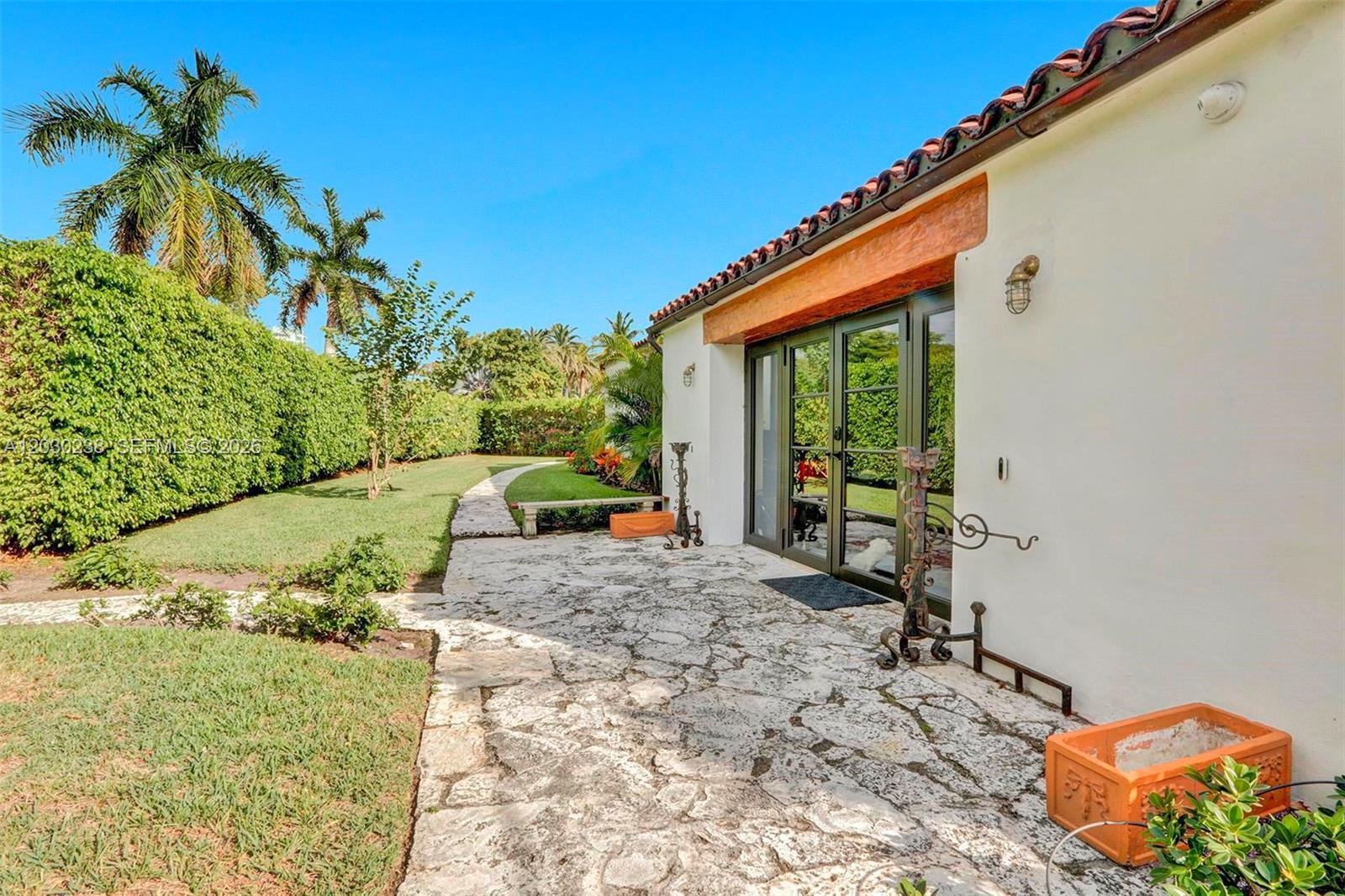 1928 historic home on 11,600 sq ft wedge lot in North of Alton/Pinetree Drive enclave, fronting La Gorce Park. Two neighbors, all-day sun & privacy. 
14-16 ft A-frame Florida pine ceilings, original pine floors. 3 master suites with renovated baths; windowless Inner Den with fully renovated baths (live-in nanny); Primary 7x7 ft Italian green granite steam room. Secondary Master with freestanding tub/shower.
Snow & Brazilian Panda marble kitchen, Gaggenau/Miele/Sub-Zero appliances, wine fridge & double alkaline filtration. Resort pool with Spanish glass tile & LED. New impact windows, New concrete tile roof, Italian limestone plaster. $55k Lennox (3&5 Ton) system with humidifiers. 20+ color video CCTV security.
Move-in ready & fully renovated. Standout in Miami Beach enclave.