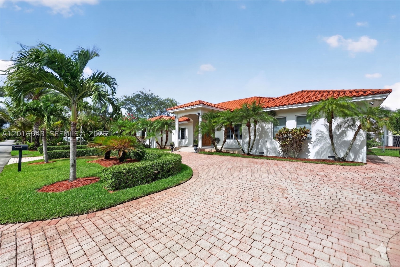 Located on a quiet street near some of the area’s top-rated public and private schools, this beautiful one-story pool home sits on an oversized 19,800 SF lot with expansive green space and offers the perfect blend of comfortable indoor living and exceptional outdoor entertaining. Soaring cathedral ceilings enhance the spacious living areas, while the pool and jacuzzi, along with a covered outdoor kitchen gazebo featuring a fully equipped BBQ area and additional half bath, create a true backyard retreat. The spacious kitchen includes stainless steel appliances, granite countertops, and an open breakfast area overlooking the pool. Additional features include impact windows, two tankless water heaters, two newer A/C's, a full laundry room, 2-car garage, circular driveway, and a fully fenced yard for added privacy and security. Conveniently located near Deering Estate, Deering Bay Yacht & Country Club, and Black Point Park and Marina.
