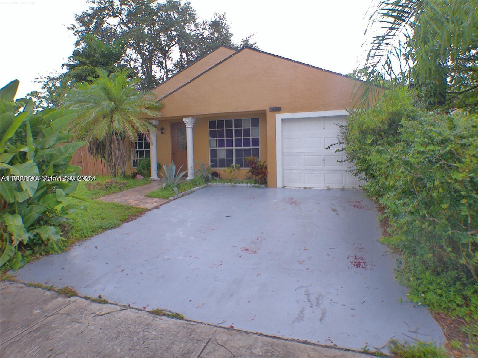 PLEASE SUBMIT YOUR HIGHEST AND BEST OFFER. THE PROPERTY IS APPRAISED FOR $440,000. BEAUTIFUL HOUSE IN PEMBROKE PINES, PARTIALLY GARAGE CONVERTED INTO 4TH BEDROOM, PLEASE DO NOT MISS THIS ONE. THE CHEAPEST HOUSE IN PEMBROKE PINES. CALL YOUR BROKER FOR DETAILS AND SHOWINGS.