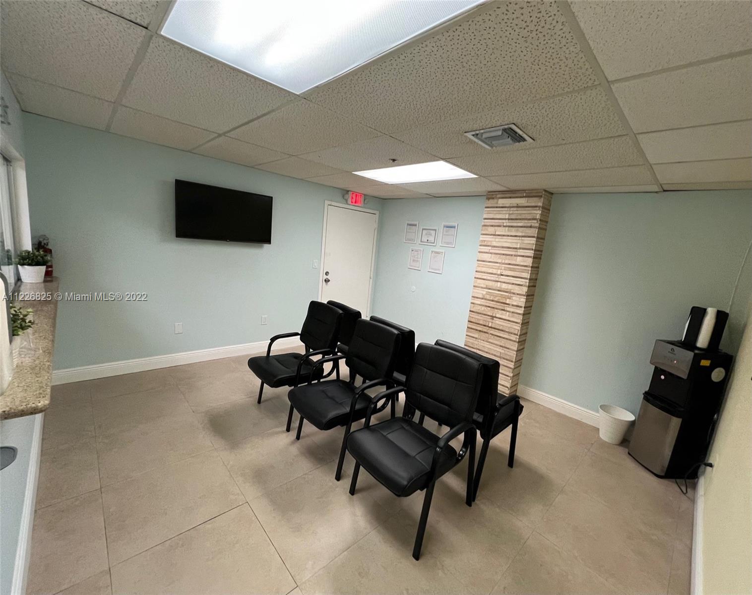 Turn key commercial office unit in a very central location.  Can be sold with the furniture and computers.  Easy to show.  Comes with one assigned parking space. Unit is 980 SF