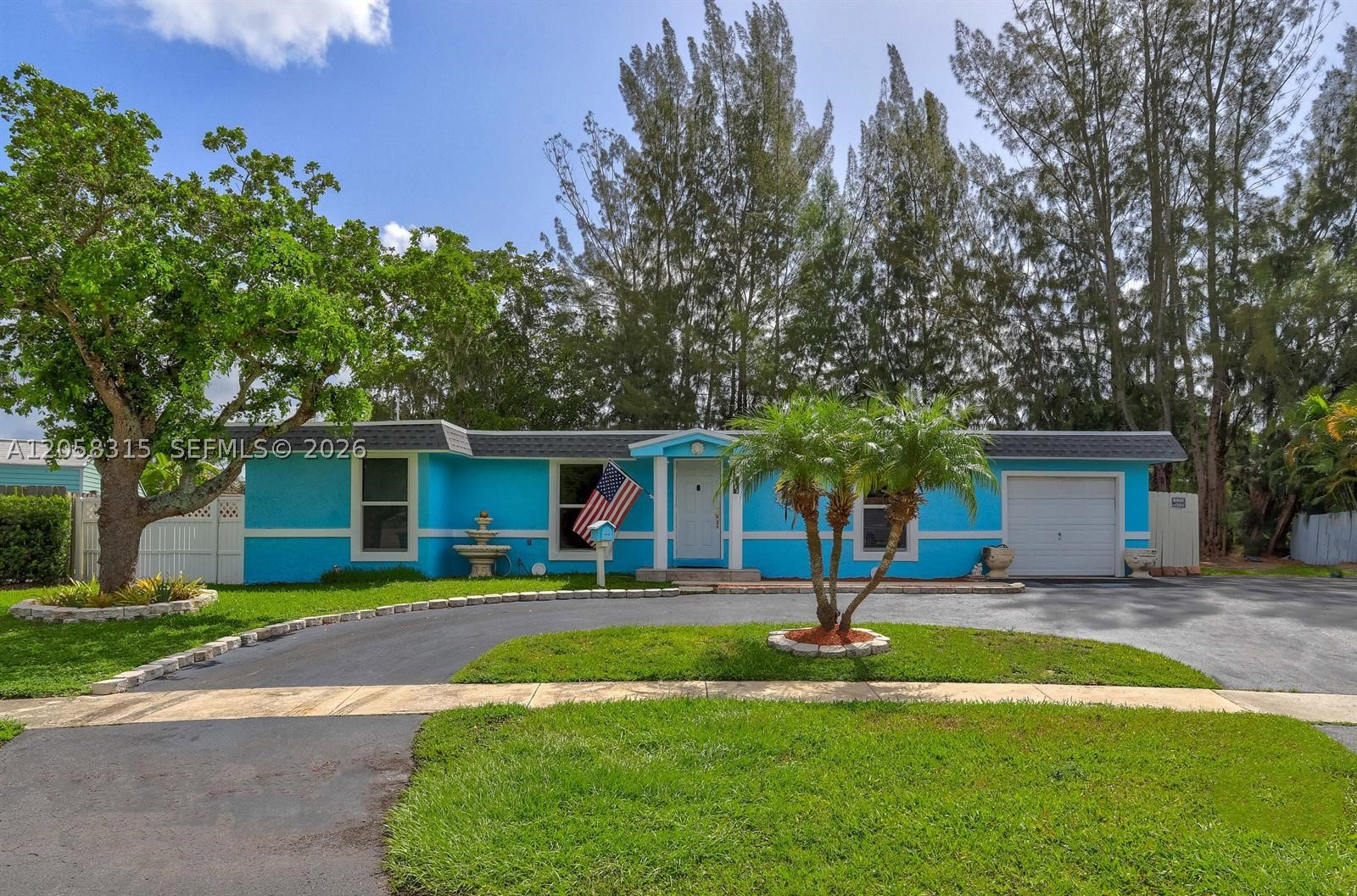 Here is your chance to get this Amazing 4/2 Single Family Home w/ Family Room & an extra large lot on the water for an awesome price. This home boasts of an Updated kitchen & baths w/ wood flooring throughout. Large bedrooms with great space. Newer Roof & AC. It also has Impact windows, 2 sheds, a large circle driveway & so much more! This is the home you've been waiting for. Sellers are motivated! Living SQFT is Larger than tax roll.