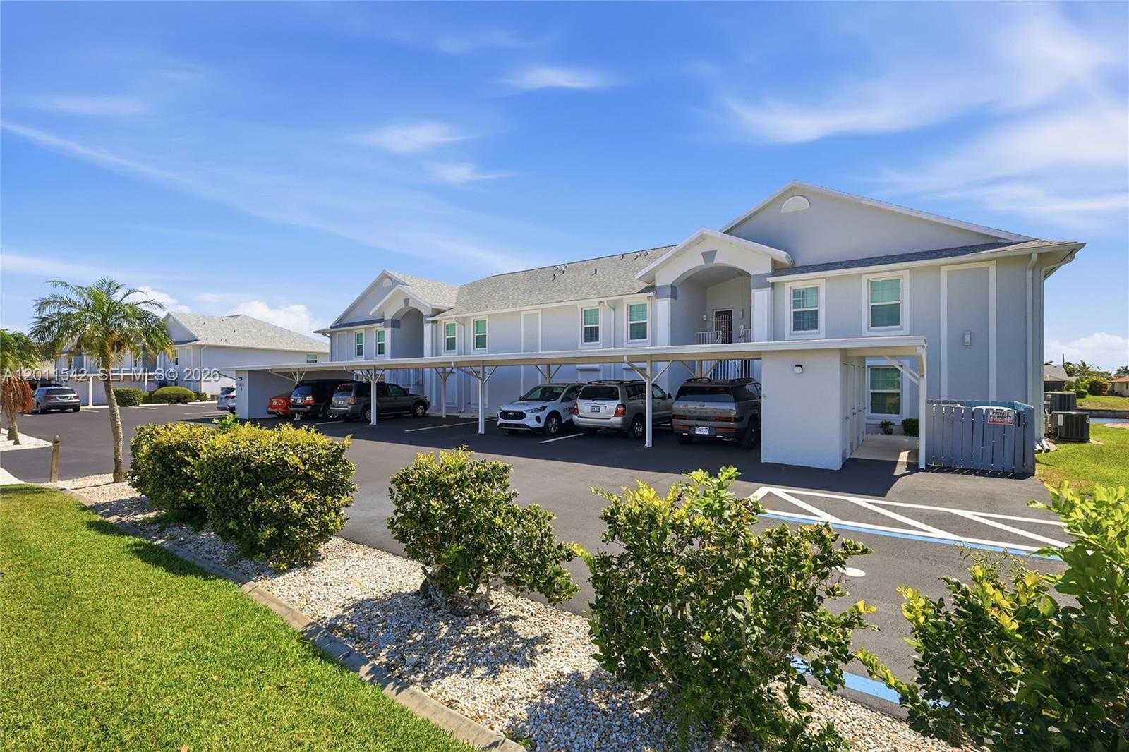Expansive Gulf-access water views define this clean 2BR/2BA corner condo on the Rubicon Canal, offered at an exceptional price! This 2nd-floor residence features an open floorplan with cathedral ceilings and hurricane impact windows on one side, creating a bright and airy coastal retreat.
Enjoy sweeping views of the canal and community waterways from the spacious screened lanai, complete with roll-down shutters for added protection. The lanai overlooks the community dock, pier, and a wide 200+ ft canal—perfect for embracing the Southwest Florida waterfront lifestyle.
Located in a smaller, well-managed, and financially sound community, residents enjoy resort-style amenities including a pool, boat dock, pier, and boat slips. A detached carport is also included for convenience.
Ideally situated in central Cape Coral, this condo offers quick access to grocery stores, restaurants, shopping, and everyday essentials while maintaining a quiet waterfront setting. With direct access to the Gulf via the scenic Rubicon Canal, this is an outstanding opportunity for boating enthusiasts, seasonal residents, or full-time living.
Option to move-in ready in a fully furnished condo, this condo delivers the perfect combination of value, location, and true Florida waterfront living—don’t miss it!