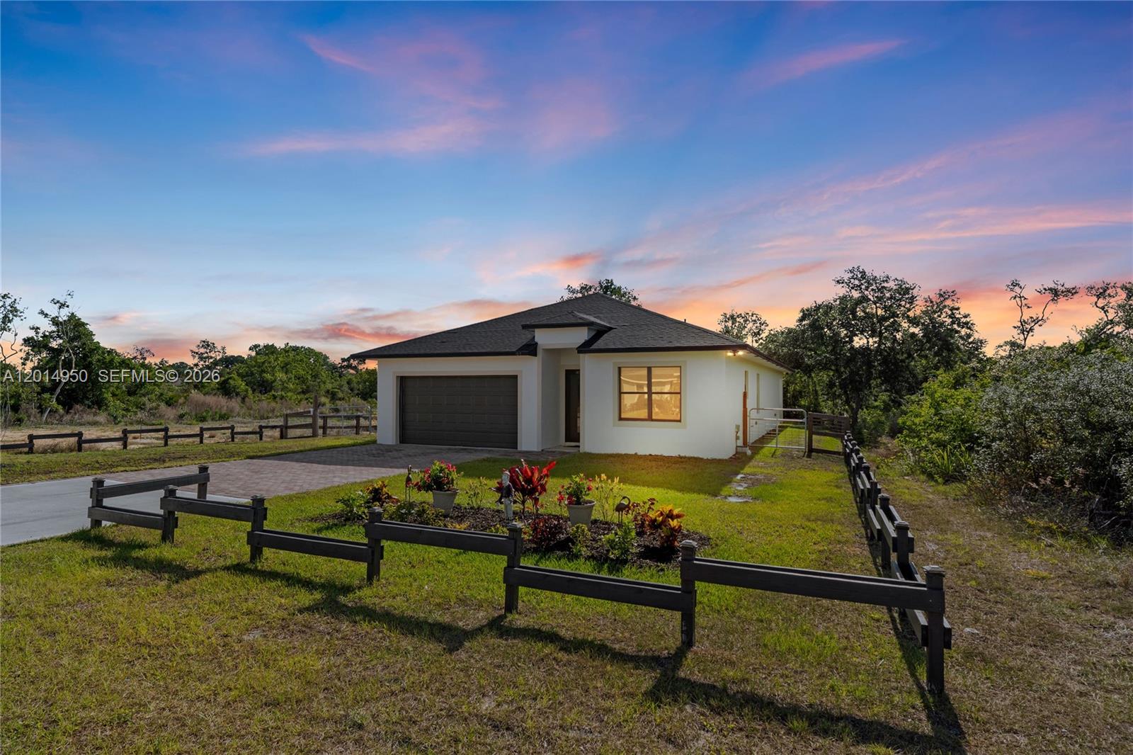 Welcome to this beautifully crafted new construction home offering 1,912 sq ft under air and 2,480 total sq ft, situated on a fully fenced 0.25- acre lot on a quiet street just minutes from both Lake Istokpoga boat ramp and Lake June. This thoughtfully designed residence features 3BR, 2BA, a flex room and a 2-car garage, combining modern finishes with functional living. The home opens into a spacious Great Room creating a bright and open layout. The kitchen is centrally positioned and boasts quartz countertops with waterfall island, stainless steel appliances, and ample cabinetry. A standout feature is the flex room enclosed with stylish barn doors, making it the perfect home office, playroom, or guest space. The primary suite offers a private retreat complete with a walk-in closet and a bathroom featuring frameless glass shower doors and modern finishes. Additional highlights include impact windows and doors and porcelain tile throughout. Enjoy peaceful living with spacious design, and convenient access to some of the area’s best boating and outdoor recreation. Shopping and dining are minutes away. NO HOA!