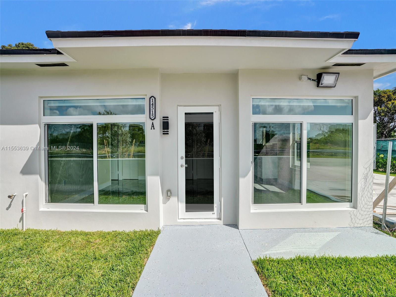 BRAND NEW 3/2 awaits it's first resident!  This duplex property has been beautifully finished with oversized porcelain tile floors, sleek modern kitchen with quartz counters and stainless steel appliances.  Both bathrooms have porcelain tiles and modern fixtures.  Split bedroom layout with custom-finished closets.  Impact doors and windows complete with Zebra shades throughout.  Washer and dryer within the unit, fenced backyard, awning covered rear patio and assigned parking. Ideal location near Naranja Lakes Legacy Park and US1 with an array of restaurants and retail.  Pets are considered with a refundable deposit. Easy to show! **Section 8 applicants move with first month's rent and deposit of $3500**