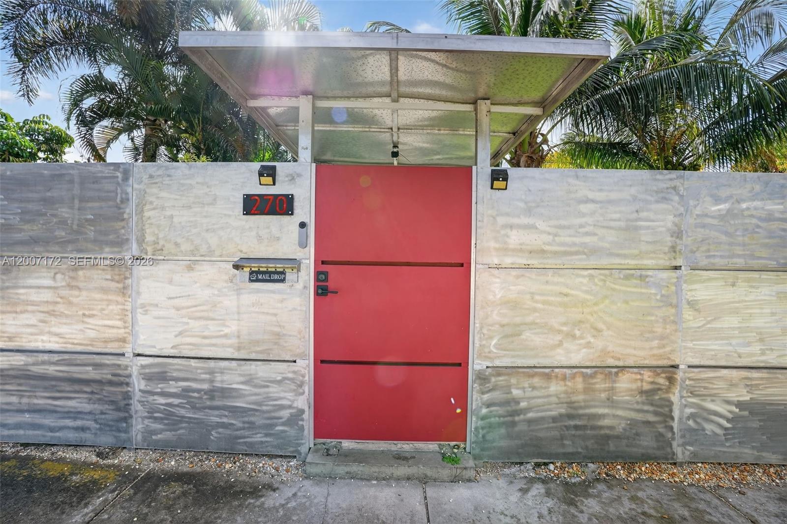 Welcome to this fully renovated mid-century modern residence offering exceptional privacy and architectural character very near Miami Shores. Fully enclosed, gated compound, 3-bedroom, 2-bath home. It showcases refined European-inspired styling and thoughtful contemporary upgrades throughout. A striking custom etched metal front fence and electric gate create a dramatic and secure entry, setting the tone for the unique design aesthetic found within. The interior features a bright, open-concept layout enhanced by impact windows, seamless indoor-outdoor flow, and elegant finishes that blend warmth with modern sophistication. The home has been meticulously updated for both comfort and functionality, including central A/C with supplemental split systems, smart home features, and durable designer laminate flooring throughout. The primary suite offers a private retreat with walk-in closet and spa-like bath. Outdoor living is equally impressive, with multiple entertaining spaces, lush landscaping, and a fully fenced perimeter ensuring complete privacy. Additional she-shed studio in the back provide flexible use as storage, office, or creative studio space. Located minutes from Barry University and Wynwood, this is a turnkey property. Ideal for buyers seeking a distinctive, move-in-ready residence in a rapidly appreciating neighborhood.
Amazing financing offered with ZERO down or rates starting at 3.99% for a payment as low as $2589 per month.