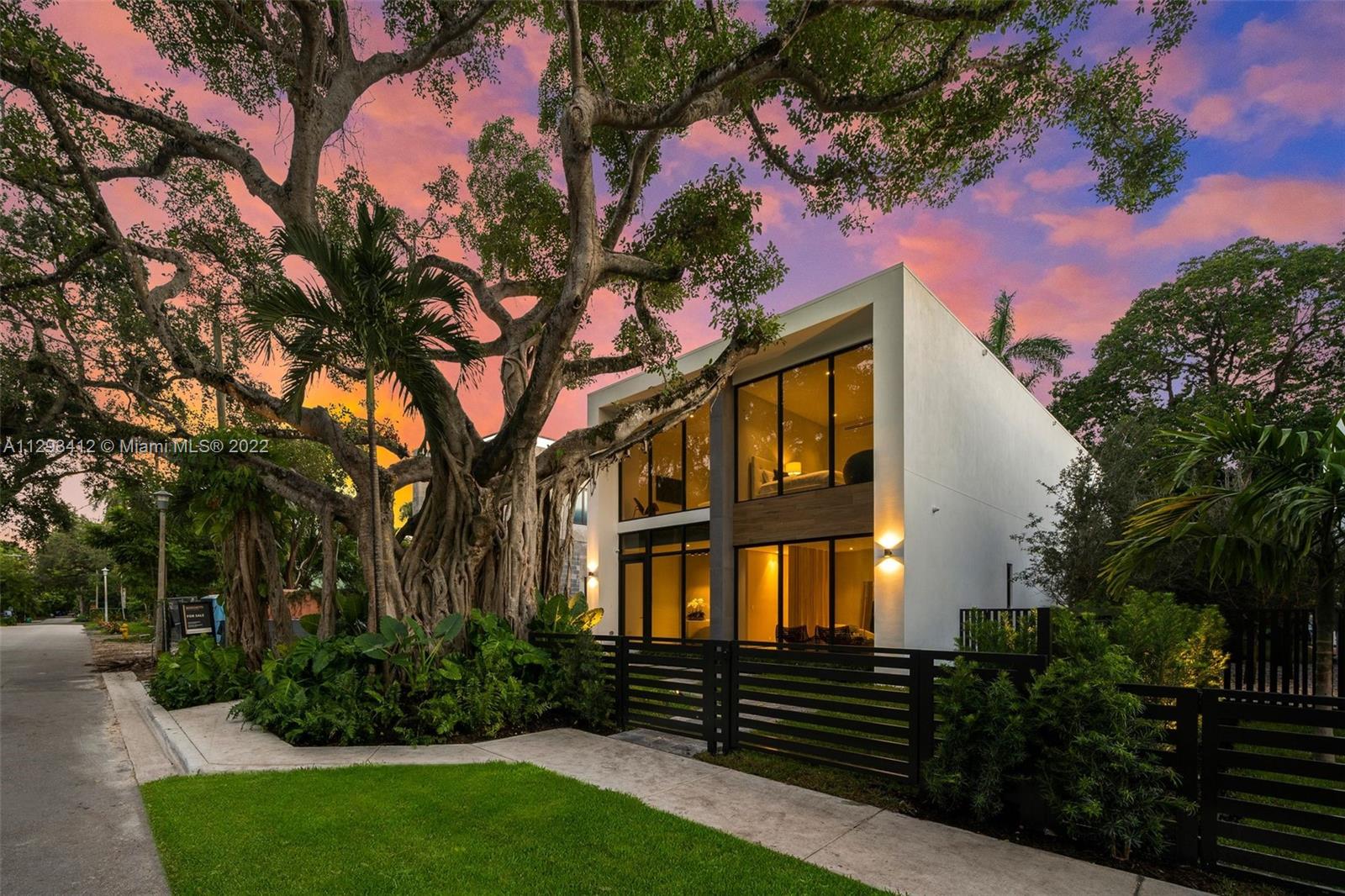 NEWLY COMPLETED HOME! Welcome to a brand new stunning home on a very quiet South Grove street. This beautiful modern home has over 4,200SF under A/C, 5 bedrooms (with the ability of adding a 6th bedroom, currently space is a open sitting area downstairs) and 6 full baths, and sits on a lot with over 7,500SF. This open floor plan connects the family room, kitchen, and living room providing you with an excellent entertainment area throughout the home. Enjoy your beautiful covered terrace and swimming pool surrounded by lush landscaping for full privacy. This home is in a prime location with easy walking distance to center Grove, restaurants, schools, and much more. Listing agent has financial interest in the property.
