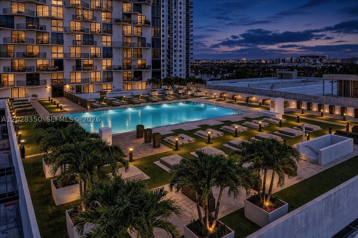 Welcome to a beautifully maintained high-rise condo in the heart of Doral, ideally situated near the prestigious Trump National Doral Golf Club and just minutes from CityPlace Doral, Downtown Doral, and major highways for easy commuting. This spacious 3-bedroom, 2-bath residence offers a bright and airy layout with neutral-colored walls and ceilings, creating a modern and versatile living space ready for your personal touch. Enjoy stunning, unobstructed views of the pool, golf course, and serene lake right from your unit, with two of the bedrooms featuring direct overlooking vistas that bring in natural light and a sense of tranquility. The unit is equipped with essential safety features including smoke detectors, and the high-rise setting provides an elevated lifestyle with scenic surroundings. Perfectly suited for tenants seeking comfort, convenience, and picturesque views, this condo offers a peaceful retreat while being close to top-rated dining, shopping, and entertainment options. A rare opportunity to lease a well-located and visually appealing home in one of Doral’s most desirable areas.