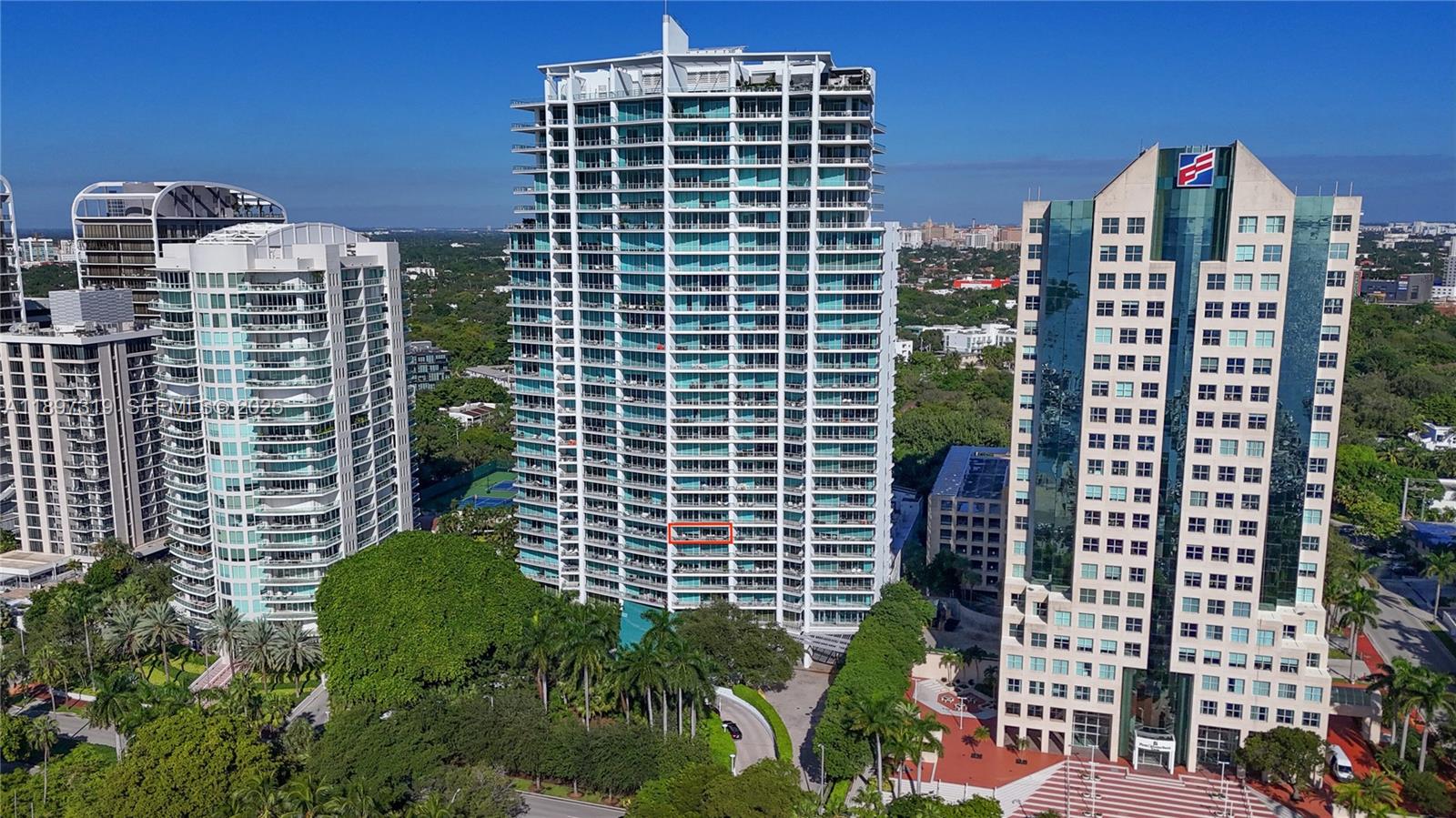 Elegant 9th-floor residence at the exclusive Grovenor House in Coconut Grove with 2,640 SF of luxurious living. With 3 ensuite bedrooms and 1 half bath, this flow-through unit features walnut wood floors, floor-to-ceiling impact doors, and private terraces with panoramic bayfront and city views. The home’s open floor plan seamlessly connects the formal living and dining areas with the family room, anchored by a stunning Snaidero kitchen outfitted with sleek cabinetry, Italian granite countertops, and Miele and SubZero appliances. Accessible by private elevator, the home offers an expansive primary suite with dual walk-in closets. Amenities include 24-hour concierge, valet, pool, gym, spa, playroom, playground, tennis/basketball courts & library. Includes in-unit laundry & 2 parking spaces.