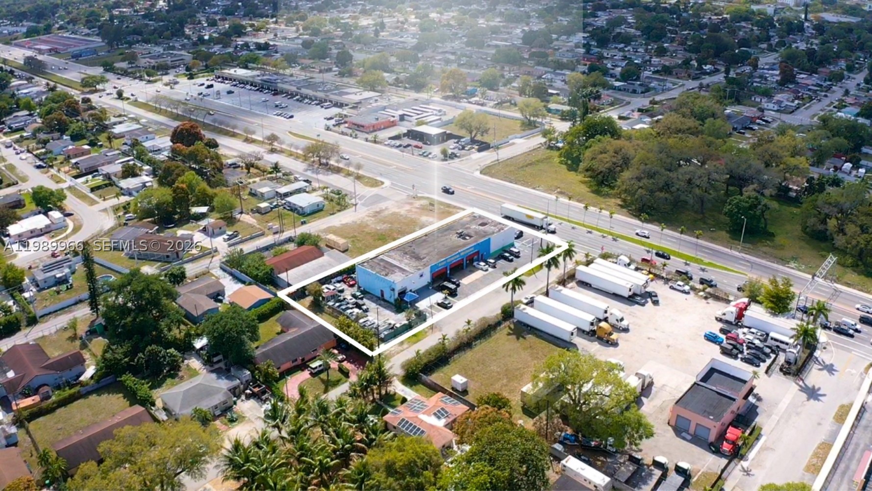 Rare high-exposure flex industrial/retail asset positioned on a signalized corner along NW 27th Ave, one of Miami-Dade’s busiest corridors with 75,000–100,000+ vehicles passing daily. This versatile property combines industrial functionality with a strong retail component, anchored by Cricket Wireless, providing immediate in-place income and tenant stability.

The 8,000 SF building sits on over 0.56 acres, offering a highly functional layout with grade-level doors, 20’ ceilings, and excess land ideal for outdoor storage, fleet use, or future expansion. The flexible configuration makes it ideal for automotive, contractor, logistics, or service-based owner-users seeking both operational efficiency and unmatched visibility.

Strategically located with immediate access to I-95 and the Florida Turnpike, and surrounded by dense residential population exceeding 500,000 within a 5-mile radius, the property benefits from strong consumer demand and consistent traffic flow.

This is a true value-add opportunity with below-market in-place income, allowing a new owner to increase rents, occupy the space, or reposition the asset to maximize returns. Opportunities to acquire a flex asset with land, exposure, and an established retail anchor tenant in this submarket are extremely limited.
