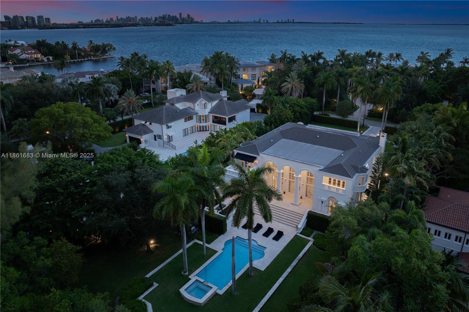 A true masterpiece of timeless elegance, this 6-bedroom, 6.2-bath estate spans over 9,400 sq. ft. in the private, guard-gated enclave of Tahiti Beach Island. Soaring double-height ceilings, marble and oak floors, and a newly designed chef’s kitchen set the stage for refined living.

Every detail has been thoughtfully curated—from the state-of-the-art movie theater to the seamless indoor-outdoor living experience. A media room, gym, and resort-style oasis with a heated pool, expansive lounge areas, and summer kitchen create the ultimate backdrop for both relaxation and entertaining.

Life at Tahiti Beach offers more than just a home—it’s a lifestyle. Residents enjoy a private beach, tennis courts, and clubhouse, along with the full amenities of Cocoplum. Avaliable furnished.