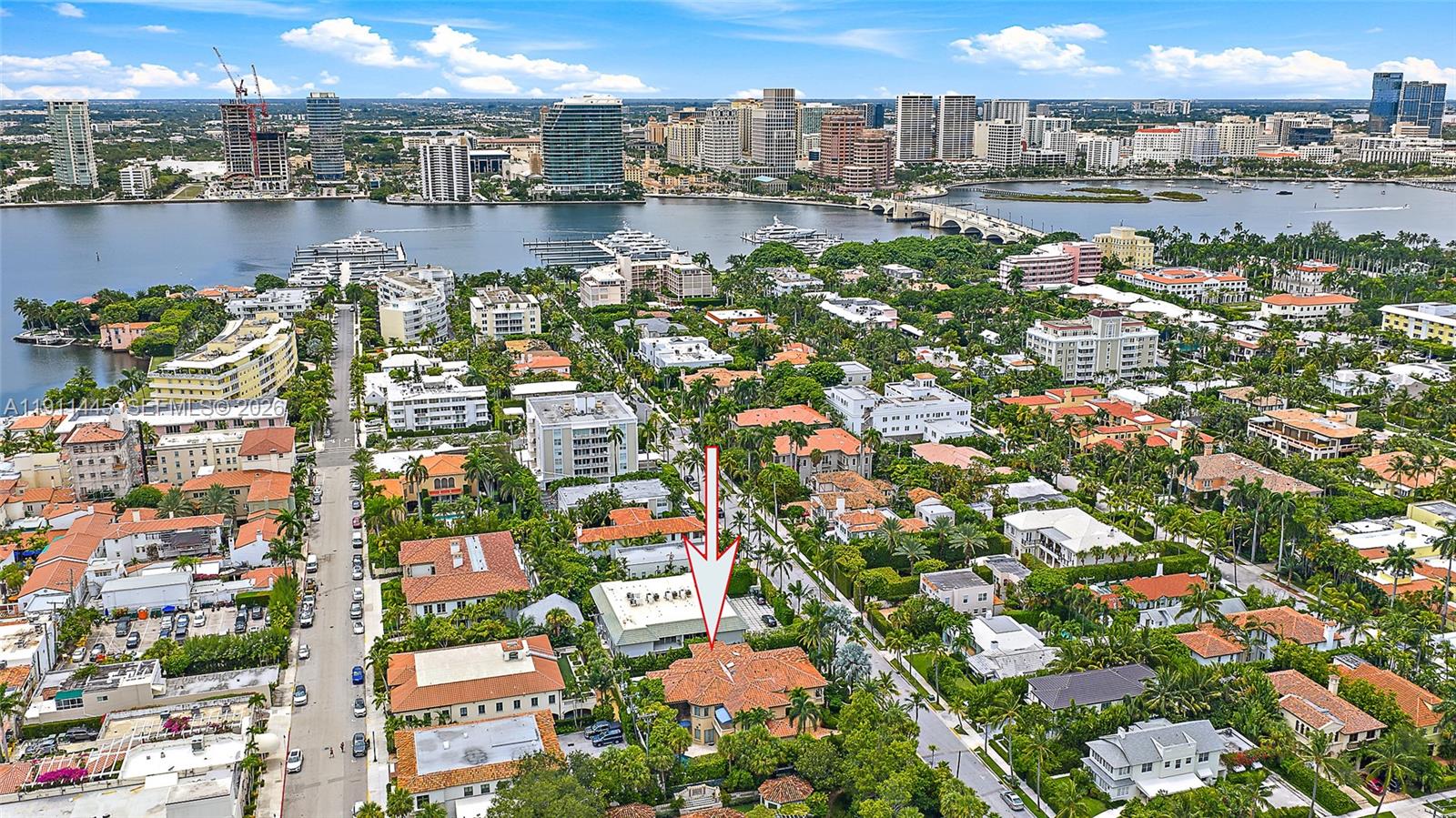 Perfectly situated just two blocks from the world-renowned shopping and dining of Worth Avenue, this newly renovated (see document section for upgrade list) exquisite 4-bedroom, 4.1-bath property epitomizes the sophistication of Palm Beach living. Spanning 4,812 square feet, the residence seamlessly combines timeless architectural elegance with modern luxury. Step inside to soaring ceilings, a striking decorative fireplace, and extensive crown molding that highlight the home's craftsmanship. Rich custom wood paneling adds depth and warmth throughout, while the expansive primary suite serves as a private sanctuary complete with dual bathrooms, custom built-in closets, and serene privacy.
