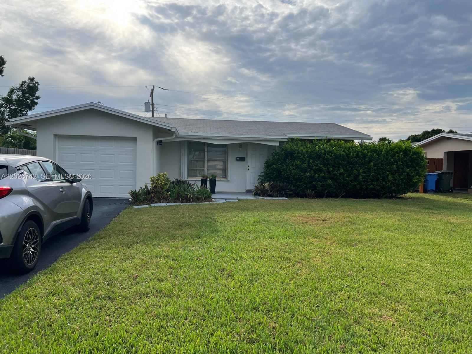 Lovely 3-bedrooms / 1-bathroom home in Oakland Park with a spacious patio and driveway! Minutes away from the expressway, shopping plazas, parks, wildlife preserves, and Keiser University. Home features an open-concept kitchen and a flex room that can serve as a bedroom or living area! Landscaping is included! Showings on weekends only!