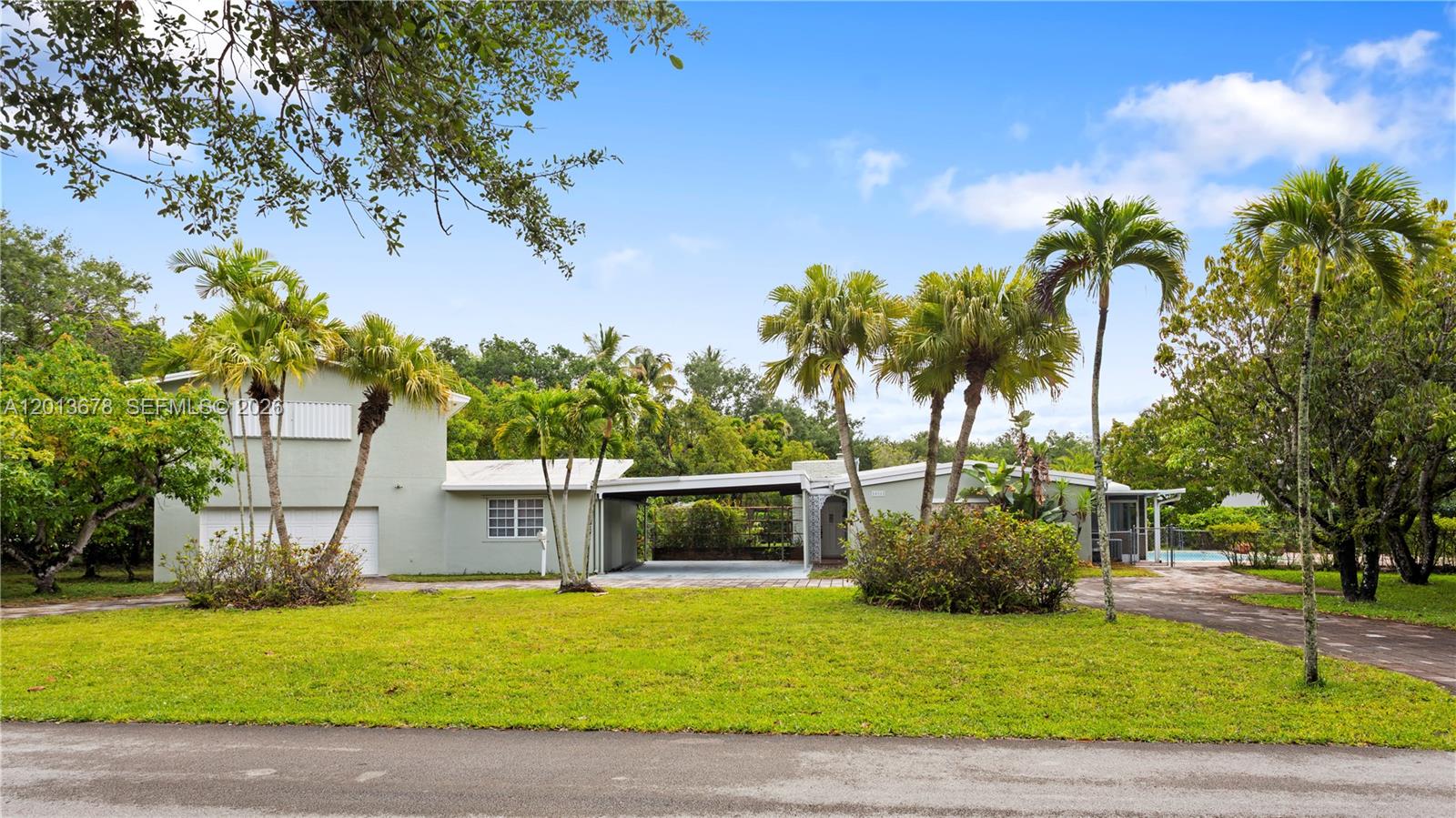 Nestled in one of the most picturesque pockets of Pinecrest, this exceptional property sits on an expansive 36,590 SF lot, offering a rare opportunity to create your dream estate in one of Miami’s most sought-after neighborhoods. Surrounded by lush landscaping and multi-million dollar homes, this prime location delivers the perfect blend of privacy, prestige, and convenience. Don’t miss the chance to live, build, or invest in the heart of Pinecrest.