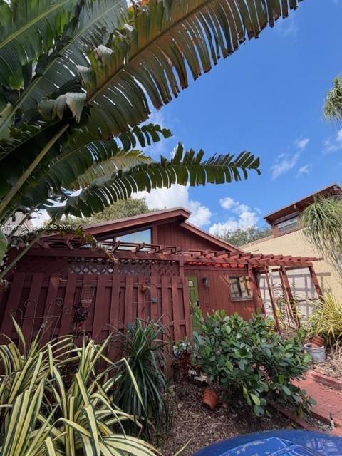 Beautiful 2-bedroom, 2-bath residence in The Villages of Palm Aire located in Fort Lauderdale. This bright and spacious home features elegant wooden floors throughout and soaring high ceilings that create an open, airy feel. The thoughtfully designed layout offers comfortable living and dining areas, a well-appointed kitchen, and generously sized bedrooms with ample closet space. Private fenced patio in the rear for all your outdoor entertainment needs. Enjoy a peaceful community setting with convenient access to shopping, dining, golf courses, and major highways. Perfect as a primary residence or seasonal retreat in a prime South Florida location.