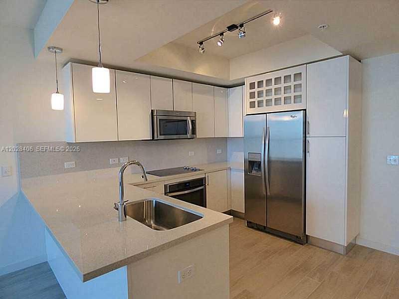 2 bed / 2 bath above the shops, restaurants and bars of Mary Brickell Village & Publix. Unit has upgraded porcelain floors throughout and upgraded build out closets. Italian lacquer cabinets in the kitchen & s/s appliances. Live in the middle of it all on the most convenient street, South Miami Avenue. Just an elevator away from the shops and restaurants. Great views from this unit. Enjoy all the amenities & lifestyle of nine. East water views.
