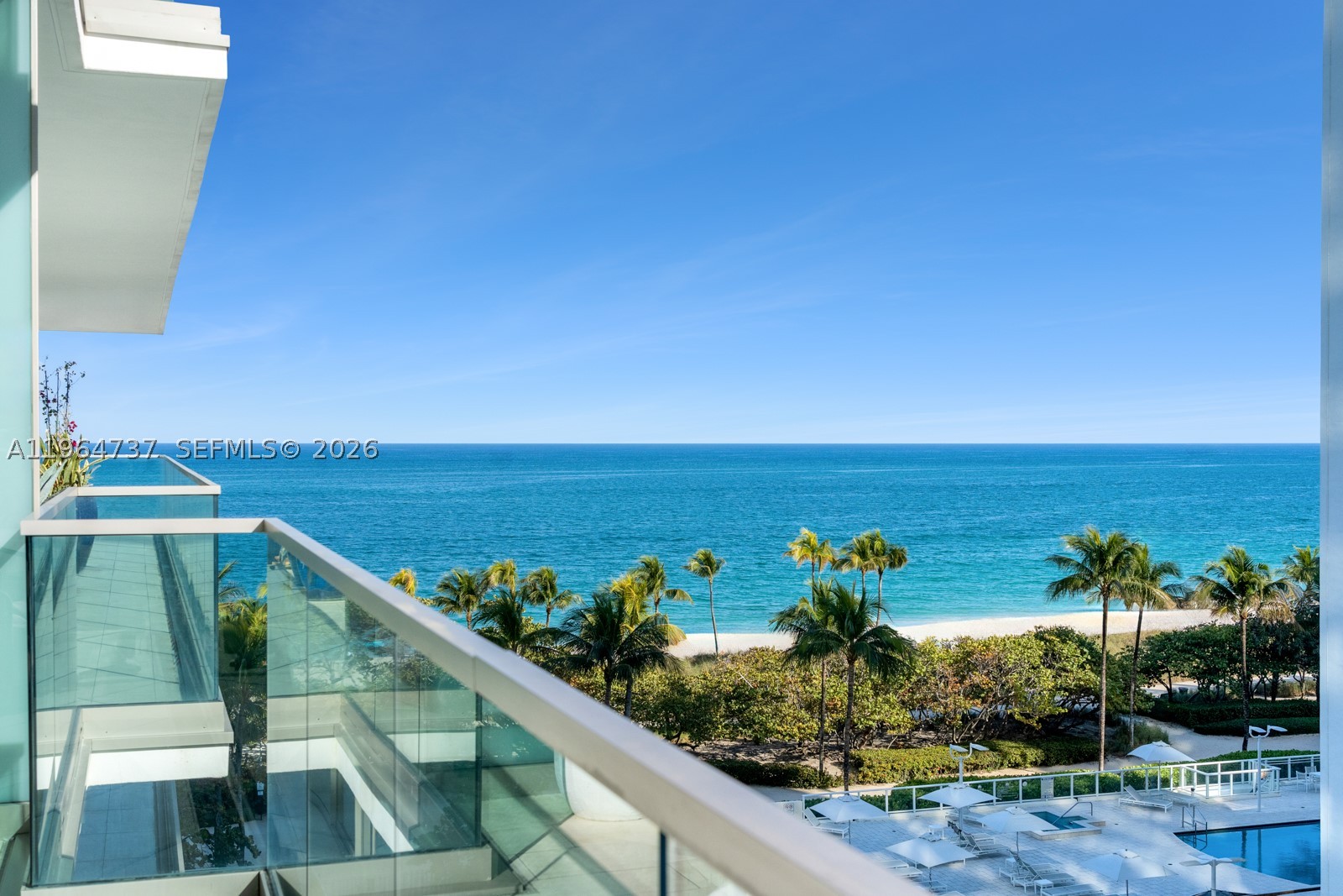 This refined corner residence at Oceana Bal Harbour offers a turnkey opportunity to live surrounded by light, water, and sweeping horizon views. Intracoastal vistas and partial ocean views unfold through dramatic floor-to-ceiling glass, capturing Miami’s breathtaking sunsets. Located in the South Tower, the thoughtfully designed two-bedroom, two-bath layout balances sophisticated comfort with effortless livability. The sleek Dada kitchen features Gaggenau appliances and elegant Calacatta marble finishes, seamlessly integrated into the open living and dining spaces. 

Set within Bal Harbour’s most prestigious waterfront enclave, residents enjoy world-class amenities including a spa, clay tennis courts, oceanfront dining, concierge services, and 24-hour security — all moments from the sand, yet worlds above the ordinary.