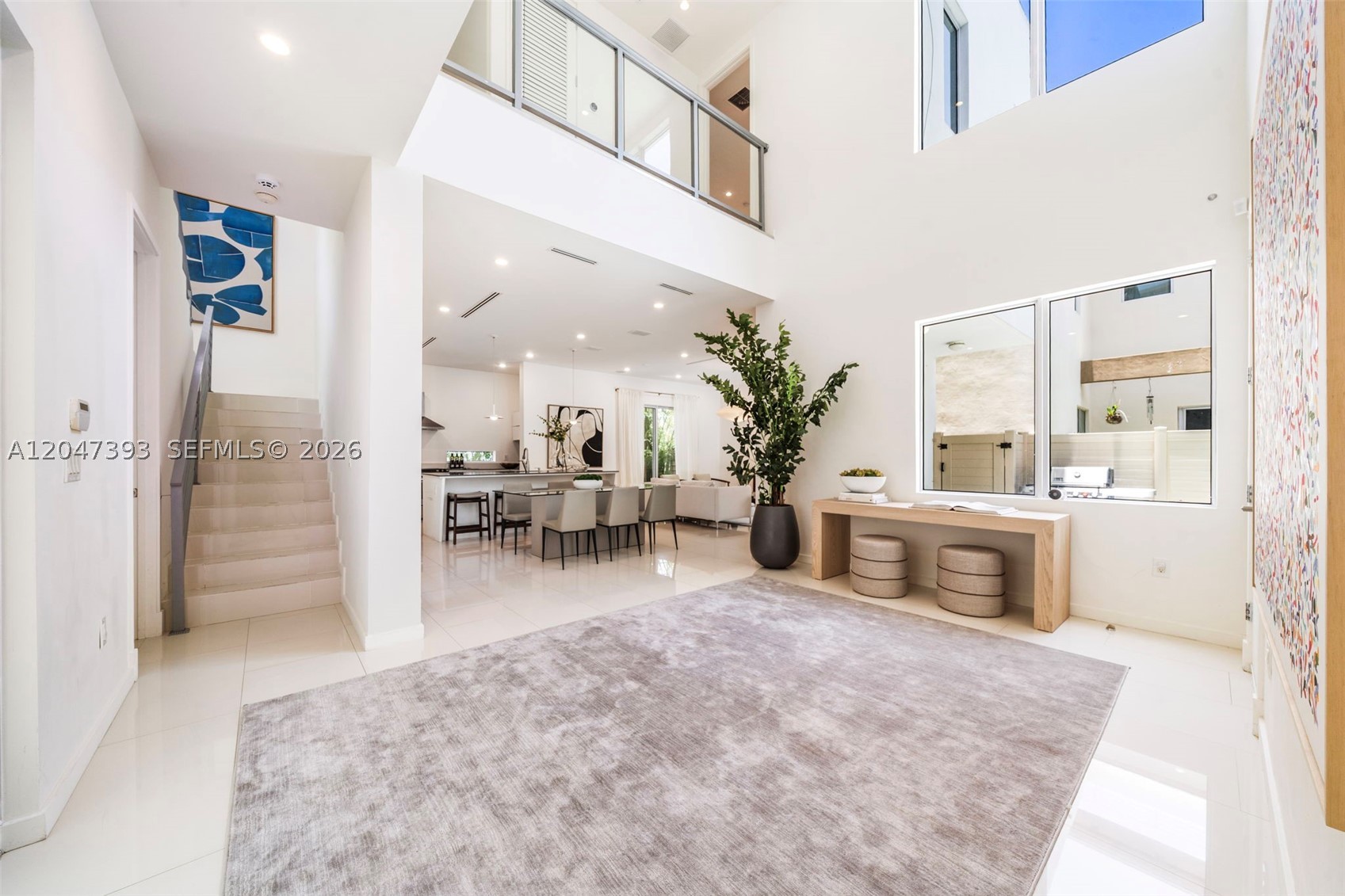 Experience the best of Coconut Grove in this modern 3 bedroom 4 bathroom residence that lives like a single-family home. No shared walls. Built in 2011, it offers nearly 2,600 SF of bright, open living spaces designed for effortless everyday living and entertaining. A dramatic double-height foyer welcomes you inside, leading to an expansive kitchen with stainless steel appliances that opens seamlessly to the dining and living areas. The scale of the kitchen offers exceptional potential to create the culinary space of your dreams. Just beyond  the living room, a charming courtyard with pool and barbecue offers the perfect setting for relaxing outdoor year-round. Upstairs you will find 3 spacious bedrooms, each with its own en suite bathroom. The rooftop terrace, overlooking the lush tree tops, features a summer kitchen and is perfect for entertaining under the stars. A one-car garage and a charming front yard complete the home.
Located on a quiet cul-de-sac just minutes from CocoWalk, the weekly Farmers Market, waterfront parks and marinas, top-rated schools, and the Grove’s renowned restaurants and boutiques, this home combines privacy, space, and an exceptional lifestyle in one of Miami’s most desirable neighborhoods.