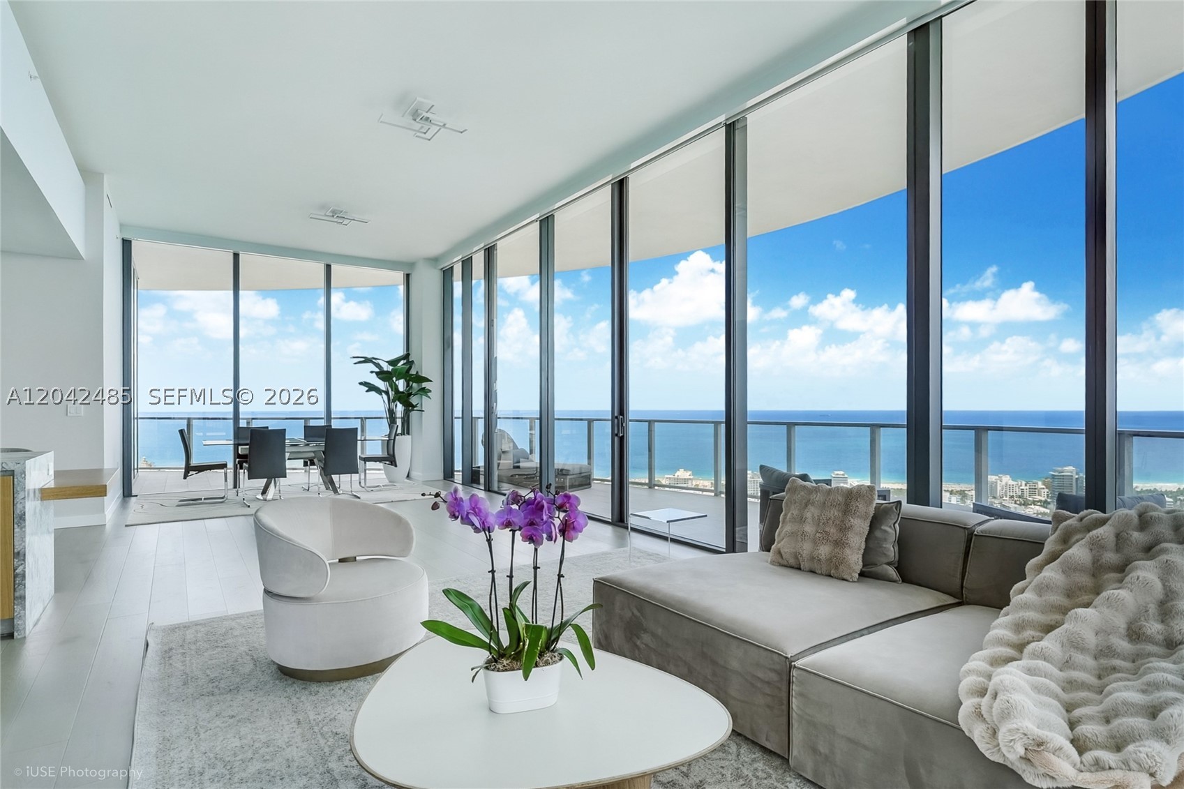 An ultra-exclusive corner residence at Five Park offering 3,200 SF of interior living space and 1,100 SF of wraparound terraces. Positioned on a high floor just below the penthouses, this exceptional home showcases breathtaking 180° views of the Atlantic Ocean, Miami skyline, South of Fifth, and Fisher Island through dramatic floor-to-ceiling glass and soaring 12’ ceilings.
Recently reimagined into a spacious 3-bedroom layout, the residence now features a fully redesigned chef’s kitchen that enhances the flow of the home while opening up even more spectacular skyline views. Thoughtfully upgraded throughout with an Apple Smart Home system, custom-built closets, electric blinds, and a beautifully renovated primary bath.
As part of the exclusive Canopy Collection, residents enjoy privileged access to the private 26th-floor Canopy Club, along with Five Park’s world-class amenities including two resort-style pools, state-of-the-art fitness center, spa, beach club, restaurant, concierge services, and more—all just moments from South of Fifth in Miami Beach’s newest iconic luxury tower.