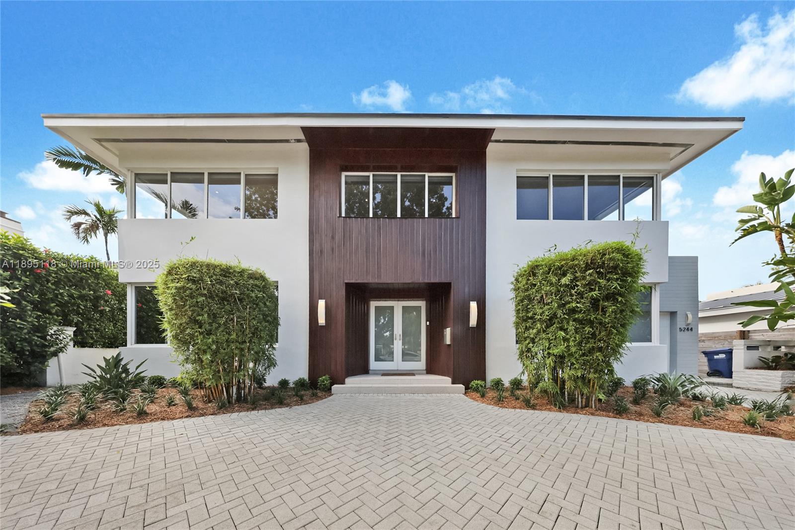 Fresh, contemporary family home—newly completed and move-in ready. Spacious open layout with 4 bedrooms and 3.5 baths. Gourmet kitchen features a Bosch gas range and a full-size wine cooler. American oak wood floors run throughout. A striking two-story foyer joins formal dining and living rooms with a curved staircase. Oversized backyard with a large free-form pool. The family room opens with a wall of glass for seamless indoor-outdoor living. Living area per Miami-Dade tax records: 4,107 sq ft. One-car garage. The property has its own electrical generator and a new gazebo.