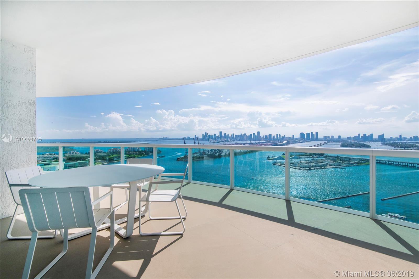 !!BEST VIEWS FROM THIS HIGH FLOOR CONDO!! Enjoy 300° views, from Breathtaking Sunsets to Inspiring Sunrises, in this stunning 32nd High Floor apt. A private foyer entrance reveals a panoramic floating city of lights & sea, displaying the best Miami has to offer. One of the LARGEST WIDE OPEN 3 BEDROOM FLOOR PLANS SOUTH OF FIFTH, with 3,365 SF, TWO SUN-DRENCHED BALCONIES, split floor plan for privacy, and spacious Master Bedroom, complete with an ultra-luxurious DEDICATED STEAM ROOM, Custom Closets & stunning DOWNTOWN VIEWS! Enjoy outdoor living on TWO TERRACES, including a unique 700SF 14-ft deep SUN-DRENCHED TERRACE built for entertainment. From Ocean to Bay to Downtown Skyline, this gorgeous Sleek & Modern apt DELIVERS! Adjacent to the Miami Beach Marina, walk to beach/park/restaurants!