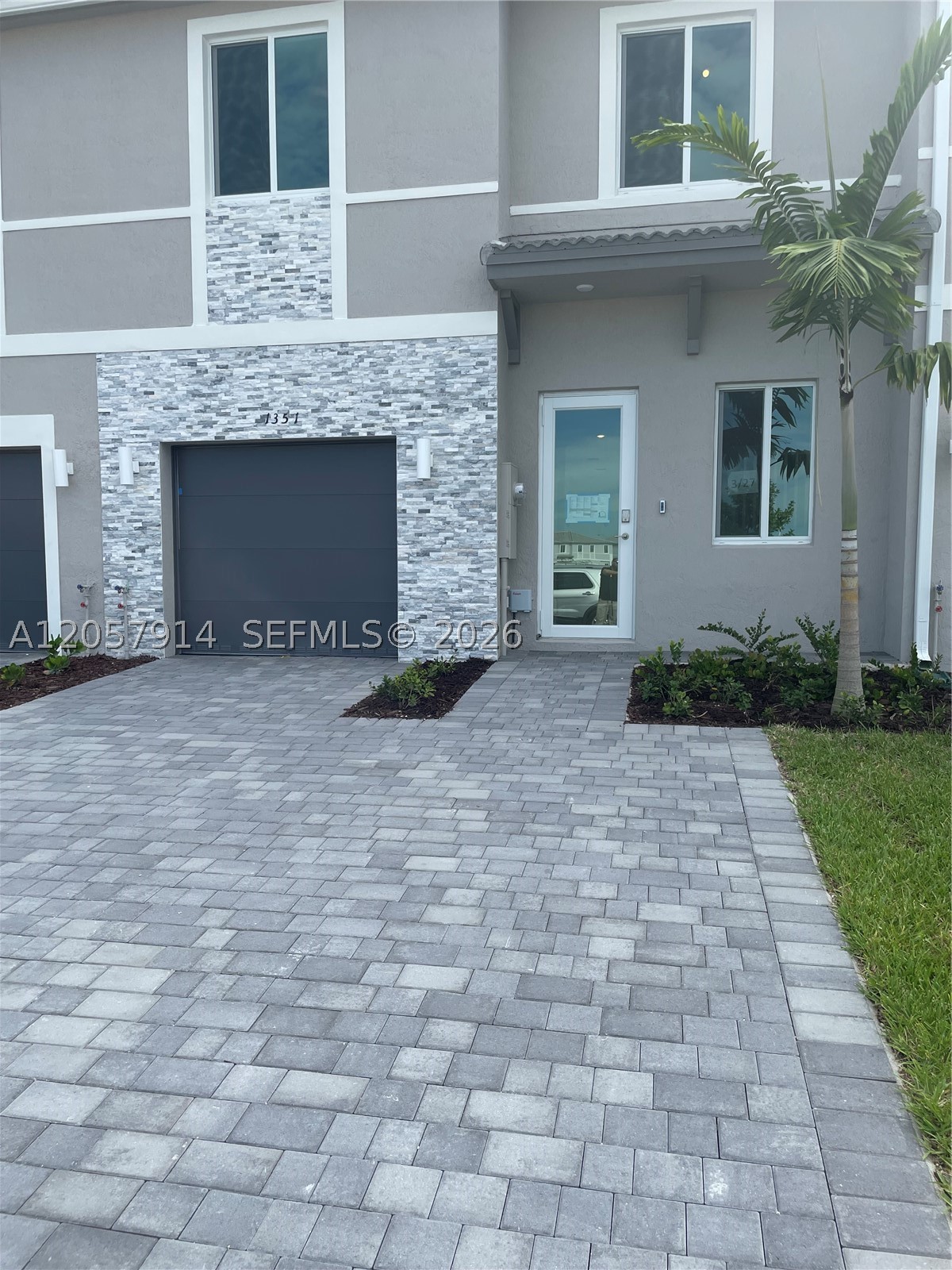 Exceptional Investment Opportunity in Terra Sol! Beautiful contemporary townhome located in the highly desirable gated community of Terra Sol in Homestead. Currently leased through July 2027, offering immediate rental income and long-term investment stability. This spacious residence features 3 bedrooms, a versatile den/office (ideal as a 4th bedroom), and 3.5 bathrooms with a bright open-concept layout designed for comfortable living and entertaining. The primary suite includes a private balcony, walk-in closet, and en-suite bath, while two additional bedrooms provide privacy and functionality. The home features impact windows and doors, smart-home technology, and modern finishes throughout. Residents enjoy resort-style amenities, including a clubhouse, pool, fitness center, basketball court, playground, dog park, and green spaces. Ideally located with quick access to Florida's Turnpike and minutes from shopping, supermarkets, restaurants, schools, and parks. HOA includes high-speed internet and basic cable. A turnkey opportunity combining prime location, modern living, and strong investment potential. Perfect for investors seeking reliable rental income in a growing South Florida market or buyers looking for a low-maintenance residence with exceptional community features. With a tenant in place, this property offers immediate cash flow potential, future flexibility, and appreciation opportunities. Terra Sol’s convenient location, amenities.