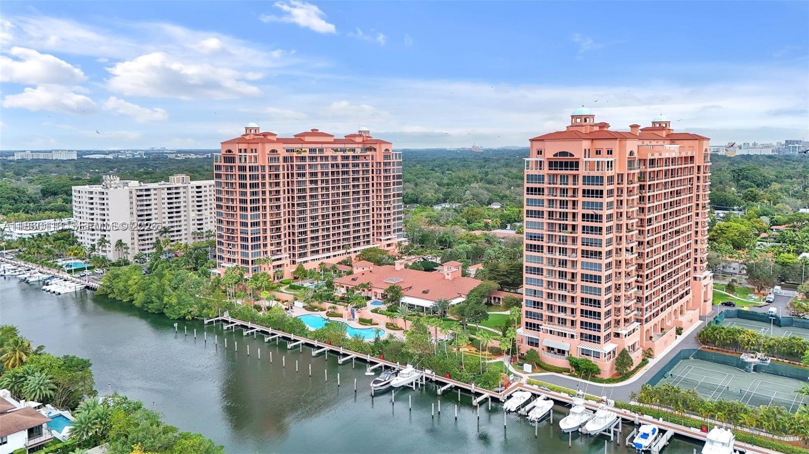 Immaculately maintained 2-bedroom 3-bathroom Gables Club Corner unit with oversized terrace overlooking buildings’ roundabout entrance. Private elevator to foyer, marble floors in living spaces, updated marble & modern kitchen cabinets, 3 large terraces for entertaining, walk in closets, updated a/c handler , and seperate laundry room. Large terrace 390 sq ft. Two (2) covered parking spaces & a storage Unit.
Reside at the Gables Club and experience the utmost care from the 24hr security, concierge, and valet. The club house provides; fitness, heated pools, beauty salon, event spaces, restaurant, Clay tennis lights up at night, Marina, & putting green. Condo rules/regulations & bylaws available upon request.