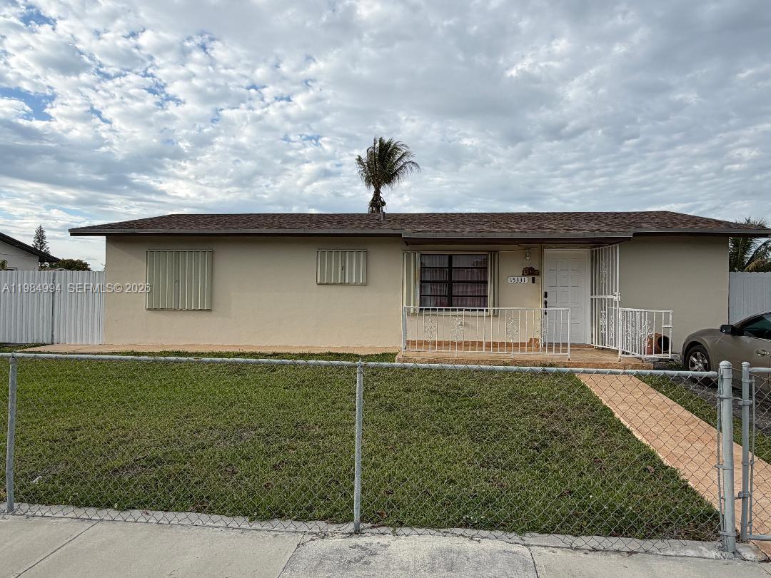 This immaculate 3-bedroom, 1-bath home sits on an oversized lot with ample space on both sides—perfect for parking a boat, RV, or additional vehicles. Inside, you’ll find tile flooring throughout, an updated bathroom, a well-sized kitchen, and a huge laundry room offering extra storage and convenience.

Recent upgrades include a new roof and hurricane shutters, providing peace of mind during storm season. The open terrace is ideal for weekend barbecues or simply relaxing and enjoying the breeze.

The property is fully fenced with gated access on both sides, offering privacy and flexibility. There’s plenty of room to add a pool and create your own backyard oasis.

This home is move-in ready and priced to sell.
