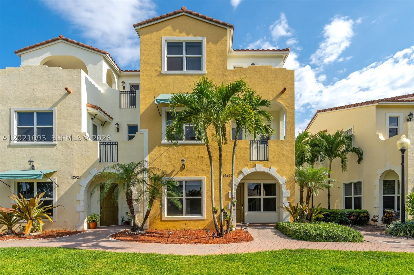 CORNER UNIT | PRIVATE ELEVATOR | LARGEST DEVELOPER MODEL — Welcome to the crown jewel of Centra Falls, one of Pembroke Pines' most desirable gated communities. This stunning tri-level townhome is the largest model the developer offers, and it has been elevated with tasteful upgrades throughout that set it apart from everything else in the community. Soaring high ceilings and an open-concept layout draw you in, centered around a chef-worthy kitchen featuring GE stainless steel appliances and granite countertops. All bedrooms are located on the third floor, including the master en-suite with walk-in closet, while a private balcony on the second floor gives you the perfect space to unwind. Currently configured as a 3-bedroom, the first floor entry — generously sized and currently used as a large family room — can easily be converted into a 4th bedroom or second master en-suite, giving you the flexibility to make this home truly work for you. Impact windows and doors throughout, plus a 2-car garage round out a home that truly has it all. Pembroke Pines is consistently recognized as one of the best places to live in South Florida — A-rated schools, world-class dining, shopping, parks, and entertainment all at your doorstep. This is townhome living redefined.