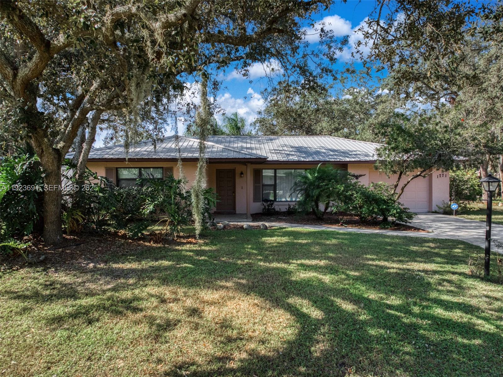 Opportunity awaits in Avon Park! This offering includes two adjacent parcels located at 1771 & 1783 N Torrington Rd,
providing flexibility for owner-occupants, investors, or future development. The property at 1771 N Torrington Rd features
a 2-bedroom, 2-bath home, while 1783 N Torrington Rd is an undeveloped 8,000 sq. ft. lot, creating added value and
expansion potential. The home offers a spacious floor plan with a welcoming living room highlighted by a brick fireplace.
An eat-in kitchen and dedicated dining area provide comfortable everyday living and entertaining space. Both bedrooms
are generously sized, and the home includes a screened lanai, separate laundry room, and an attached 2-car garage. The
fenced lot adds privacy and functionality for outdoor living. Located just minutes from US Hwy 27, this property offers
easy access to shopping, dining, medical facilities, and daily conveniences while maintaining a relaxed, residential feel. The
surrounding area features a blend of homes and open land, offering space, flexibility, and long-term potential. Enjoy the
convenience of Avon Park living with close proximity to Sebring, Highlands Regional Medical Center, local lakes, golf
courses, and outdoor recreation. A rare chance to secure a home with an additional buildable lot in a growing area of
Highlands County.